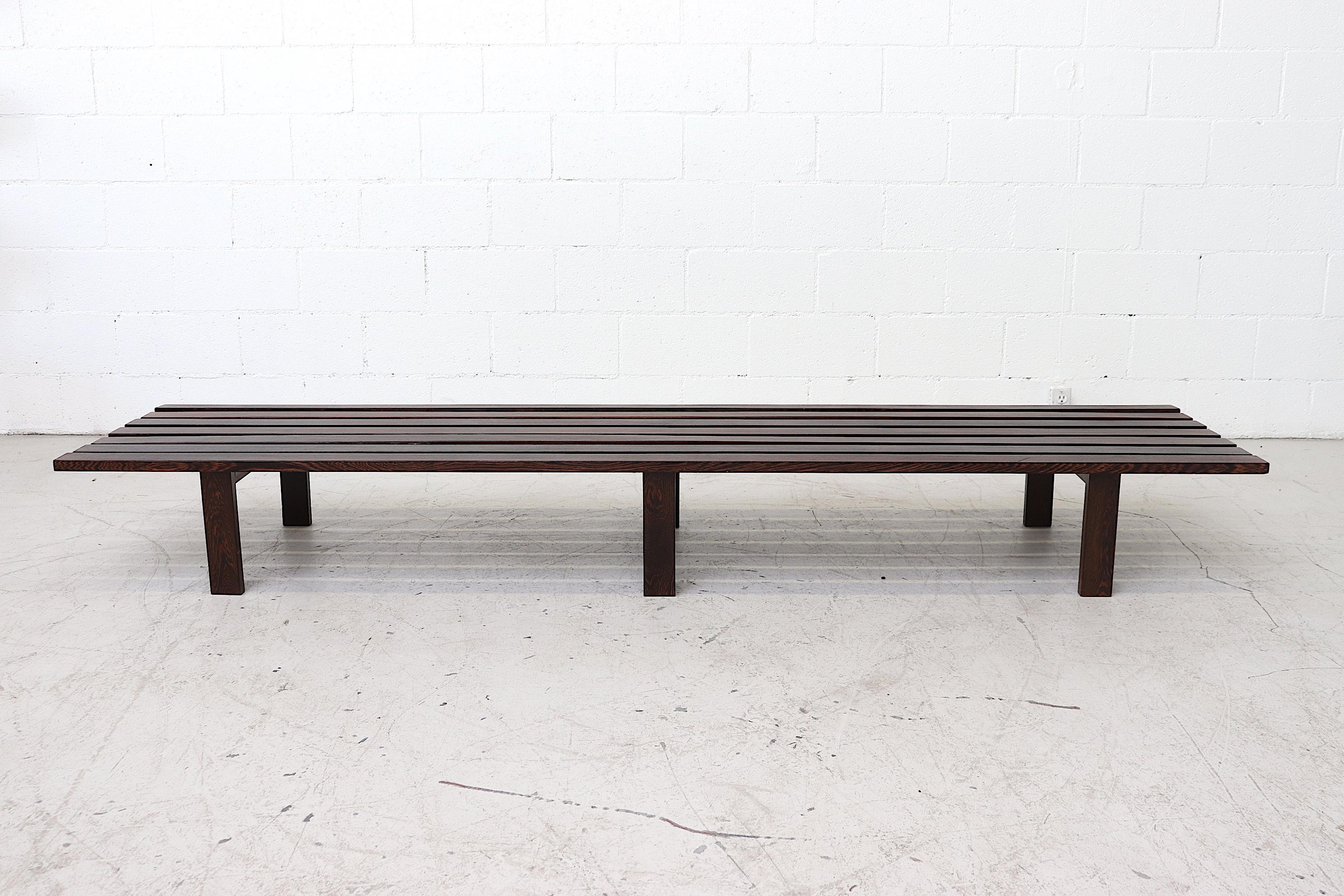 Extra long Martin Visser (attributed) Wenge slat coffee table or bench with study legs. In original condition with moderate wear consistent with age and use.