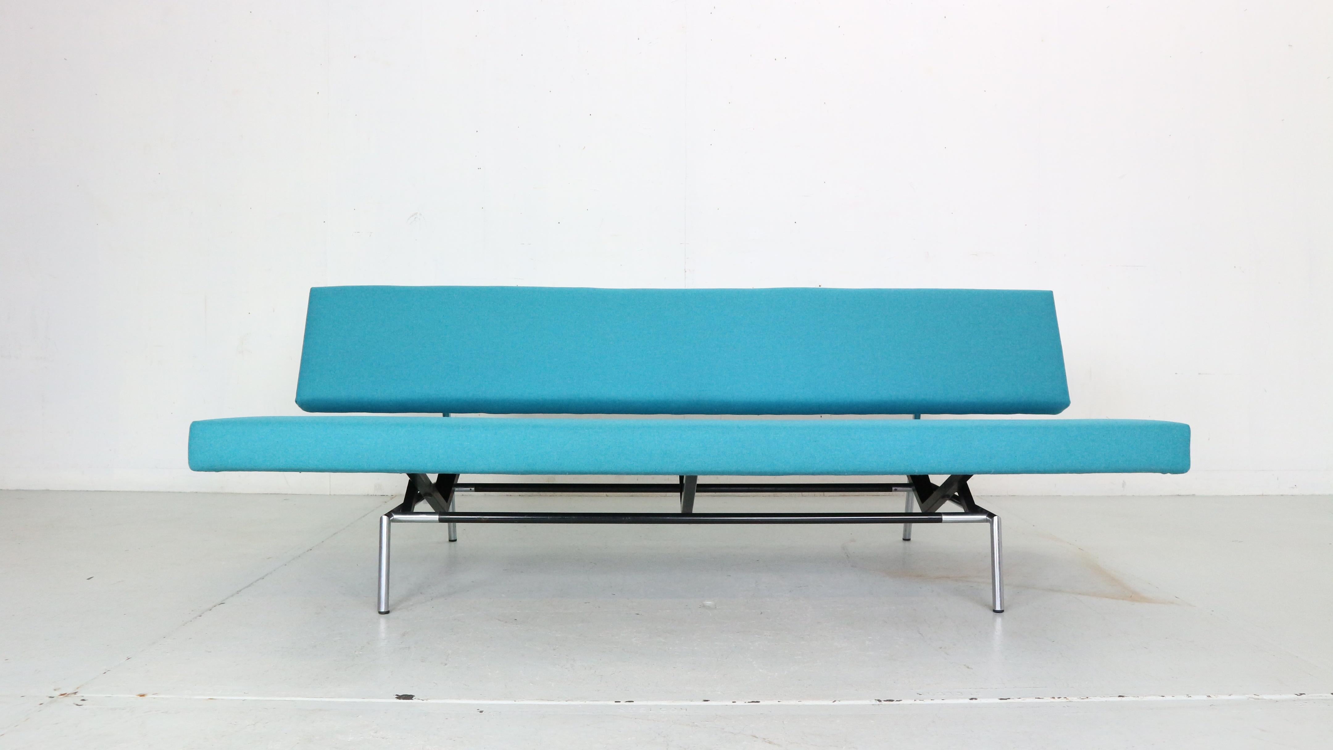 Minimalistic and timeless iconic Dutch design sofa designed by Martin Visser for t'Spectrum manufacture in 1960s period, Netherlands.
Model number- BZ53.
Original chrome and black lacquered metal frame with newly upholstered in blue colour
