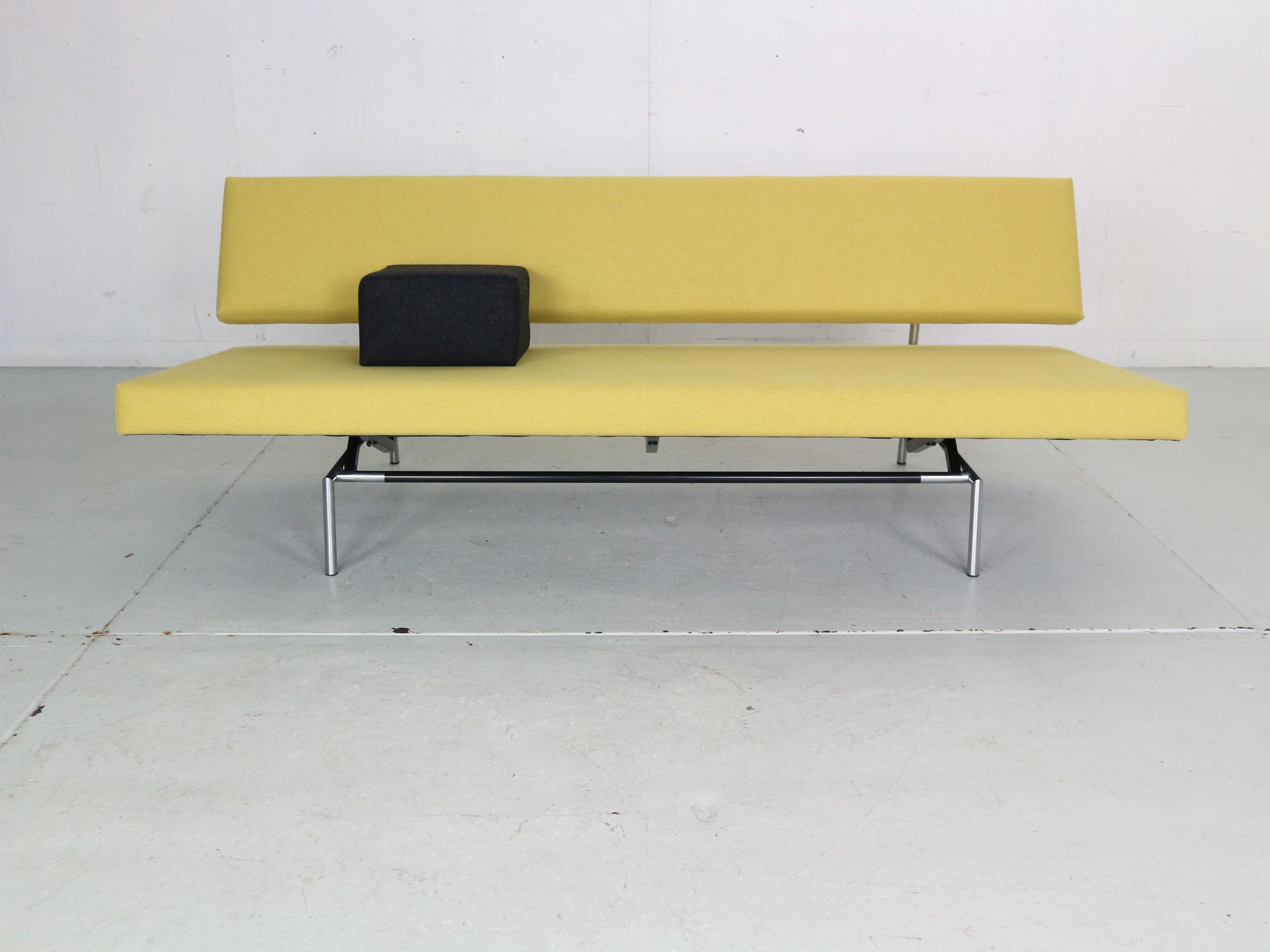 Minimalistic and timeless iconic Dutch design sofa designed by Martin Visser for t'Spectrum manufacture in 1960s period, Netherlands.
Model number- BZ53.
Original chrome and black lacquered metal frame with newly upholstered in yellow colour