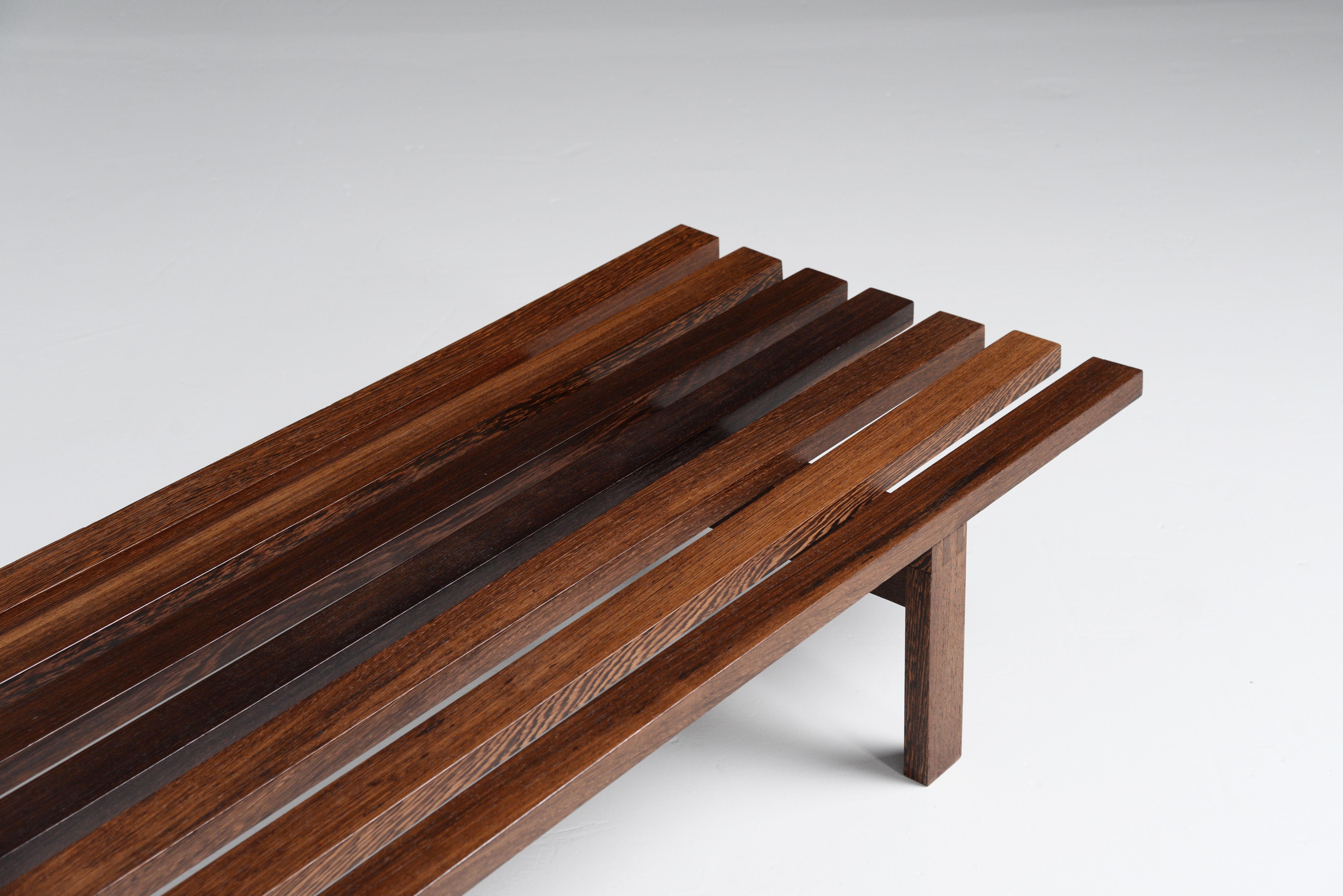 Very nice minimalist slat bench model BZ82 designed by Martin Visser and manufactured by ‘t Spectrum Bergeijk, Holland 1965. This slat bench is made of solid wenge wood, which has a very nice and unique appearance. Wenge is amongst the protected