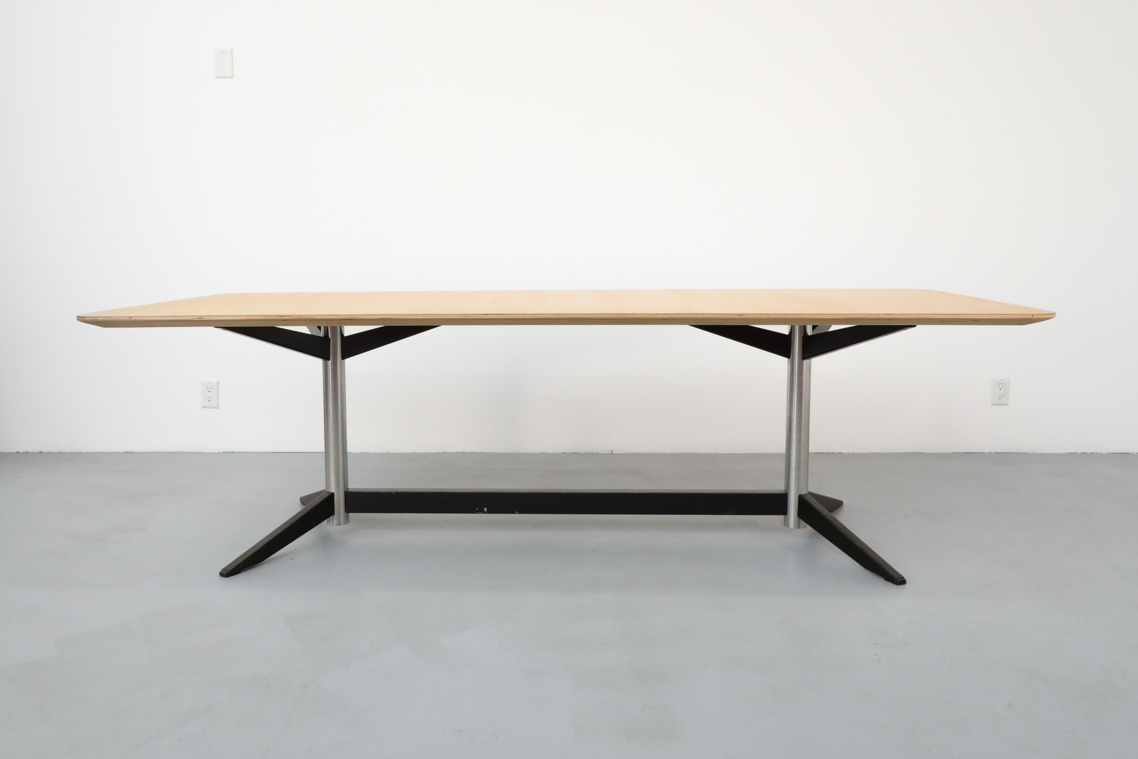 Martin Visser 'TC06/TC07' large dining table or conference table with double pedestal steel and black enameled metal base for 't Spectrum. The beautiful custom top is made of Baltic birch marine plywood and has a  large reverse beveled edge and