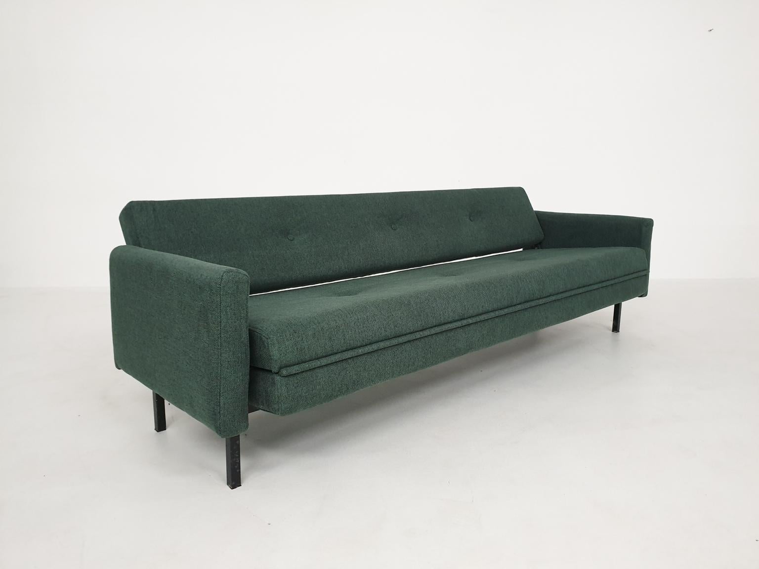 This sofa is model BR 49, often referred to as Model BR39/49, a design by Martin Visser for 't Spectrum the Netherlands. This sofa one of the most rare and sought after daybeds of the Dutch Midcentury.

In contradiction to the other sofa daybed by