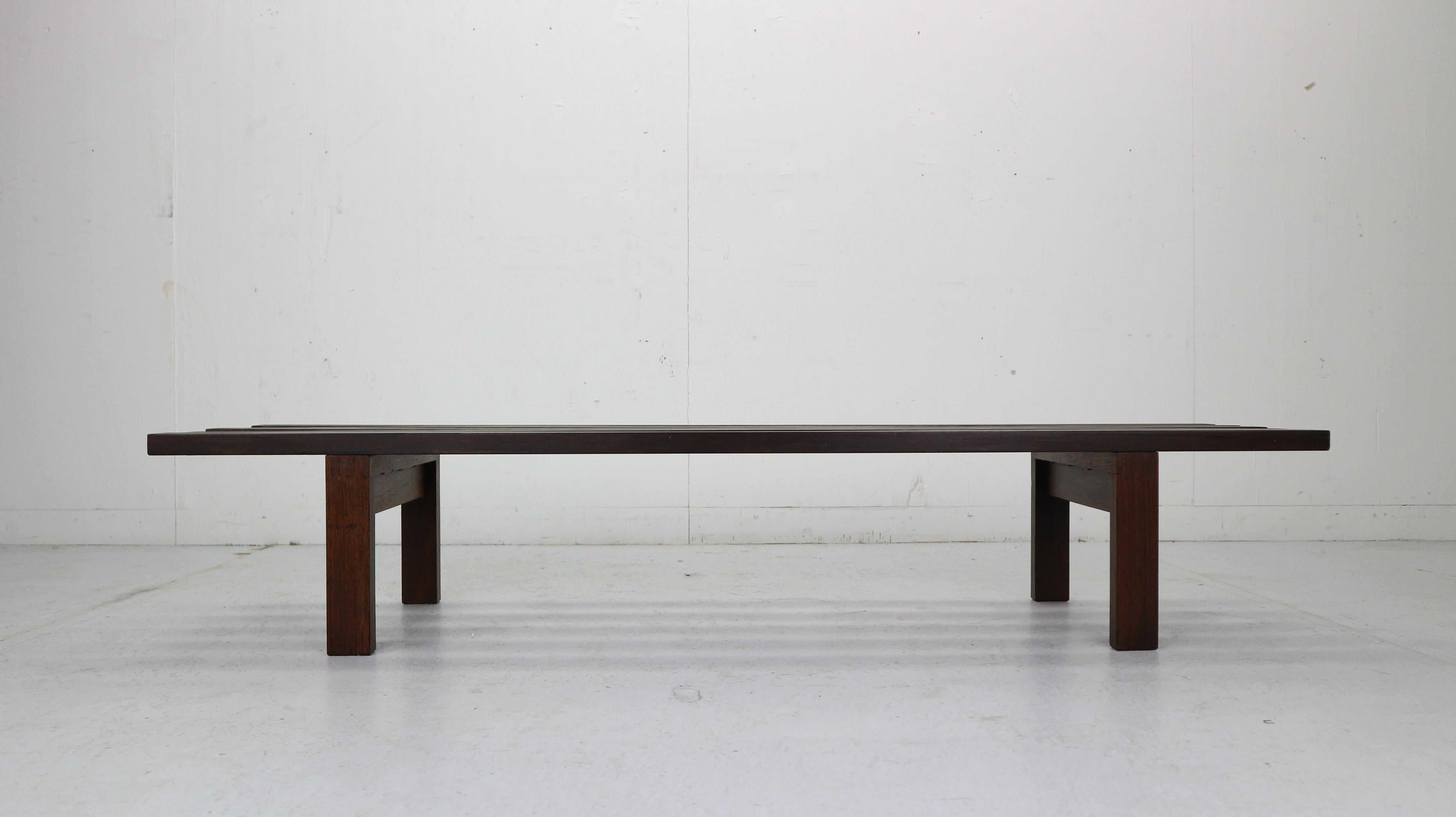 Minimalistic Dutch design wenge slat bench designed by Martin Visser for ‘t Spectrum in 1961's. This is an original version (model: BZ -81, marked) designed in 1960/1961 for het Stedelijk Museum Amsterdam.
This vintage slatted bench can be used as