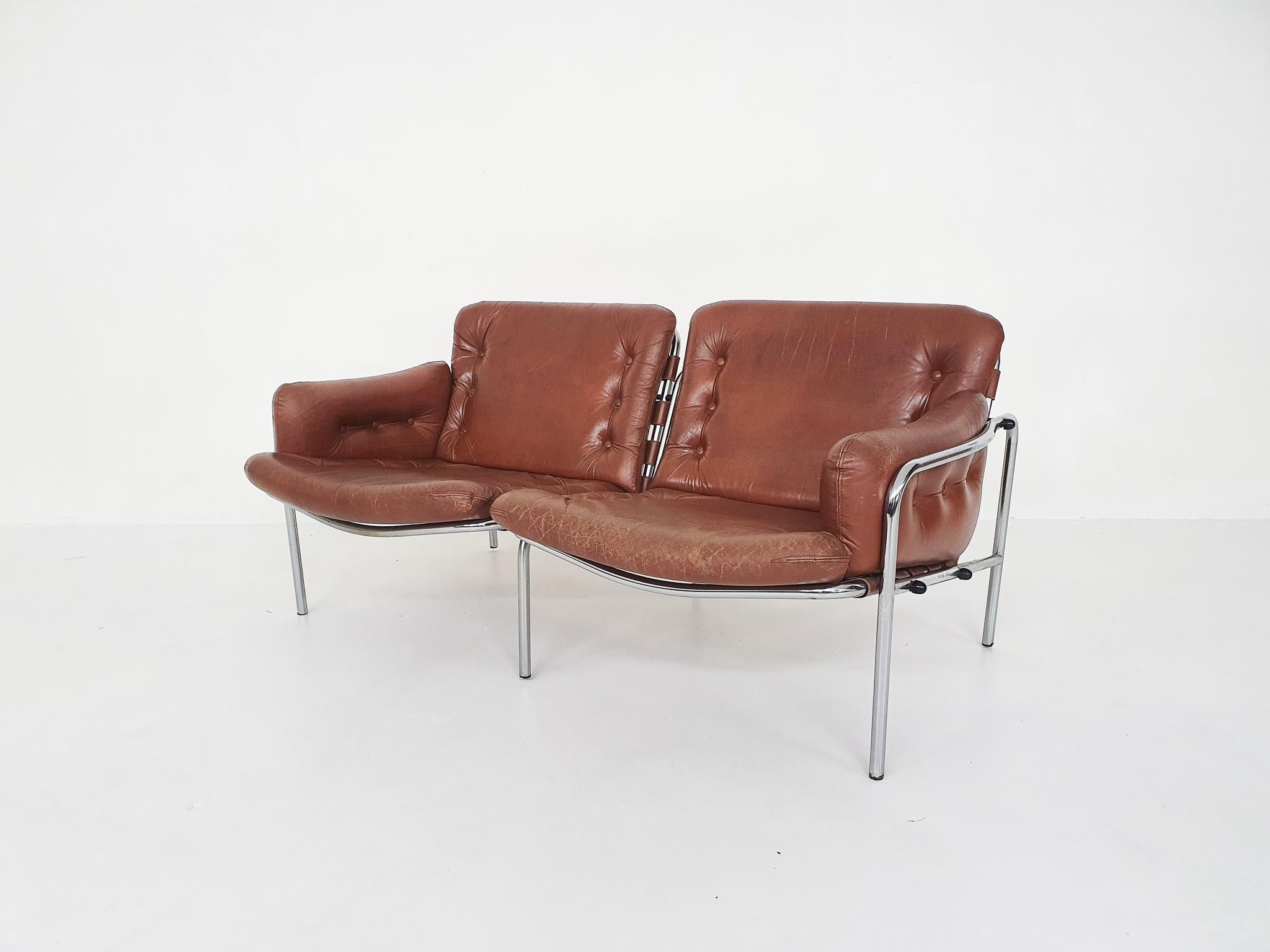 Brown leather two seater, with metal frame. Model bz09 '