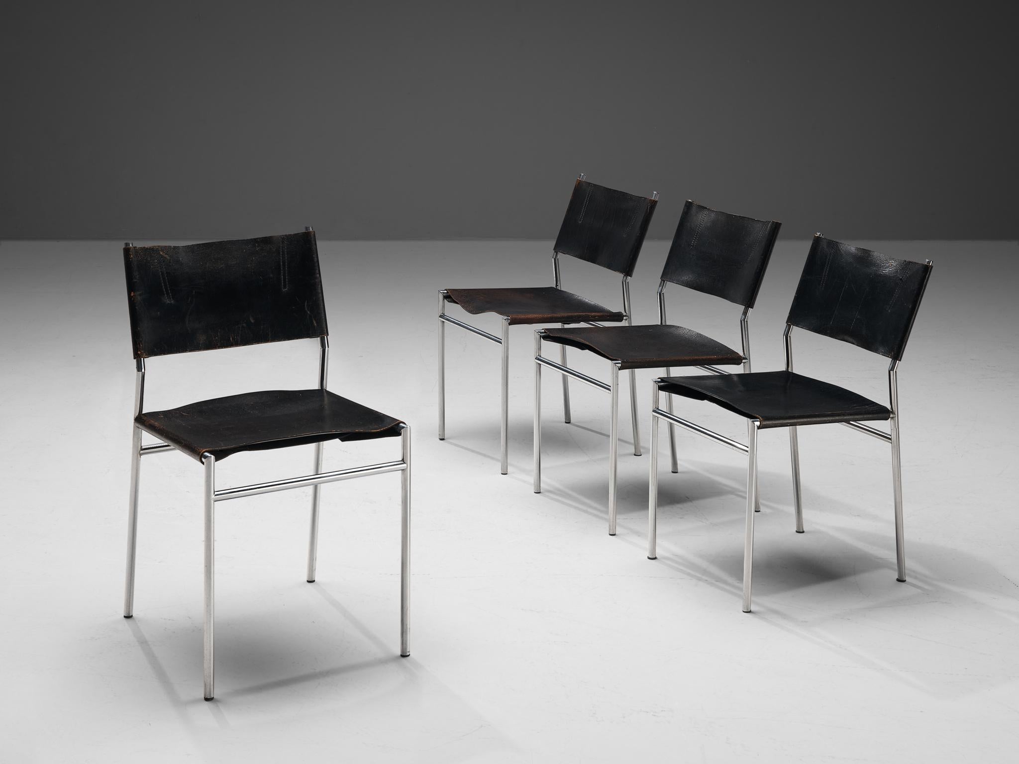 Martin Visser for 't Spectrum, set of four dining room chairs, steel and leather, the Netherlands, 1960s. 

The designs of Martin Visser are characterized by clear lines and the use of metal in combination with natural materials like leather or