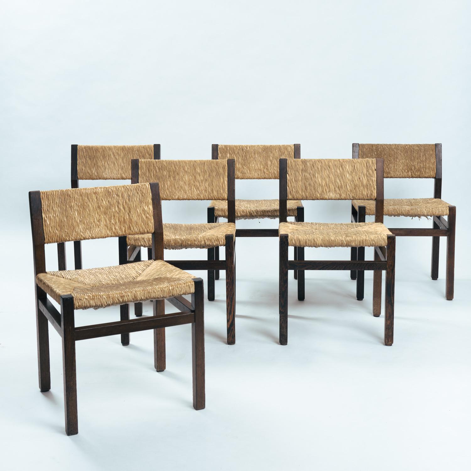 Set of 6 dining chairs by Martin Visser for 'T Spectrum in hardwood. Rectangular and square shapes of mixed luxurious organic material, that's what comes to mind if you look at these chairs. The darker wenge wood fits very well with the ligher