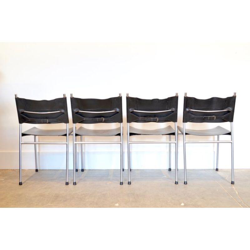 'SE06' style by Martin Visser.

Materials: Patinated black leather seat and backs with chrome tubular frames. 

Approx: 17.5”w x 19.5”d x 30.5”h, seat height: 17.5”h. 

2 styles available, additional photos and descriptions available upon