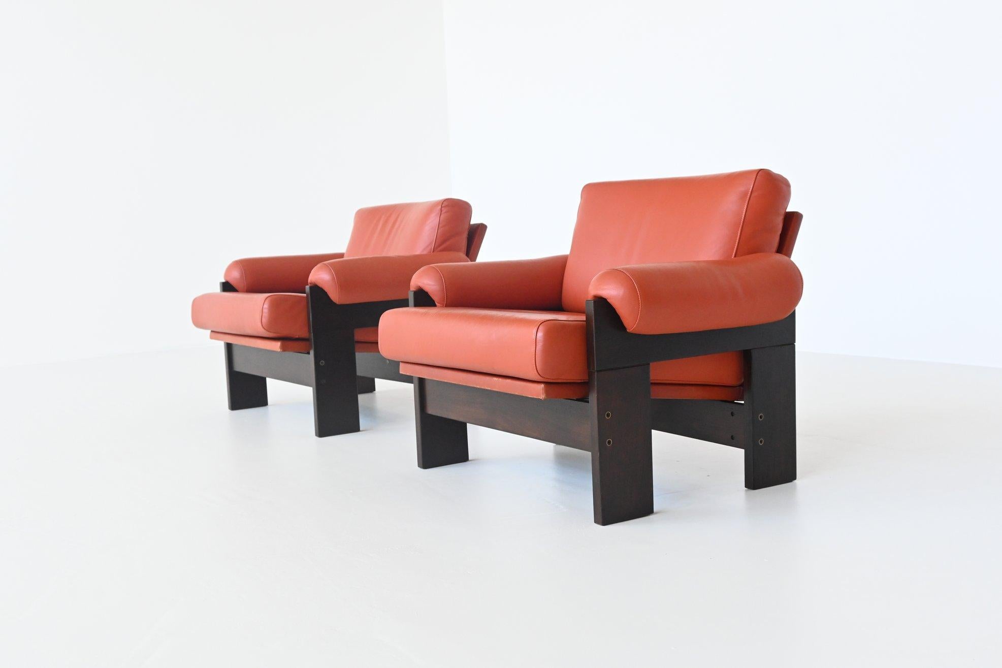 Beautiful pair of lounge chairs model SZ74 designed by Martin Visser and manufactured by 't Spectrum Bergeijk, The Netherlands, 1969. These comfortable lounge chairs have a solid wenge wood frame and they are upholstered with very nice cognac
