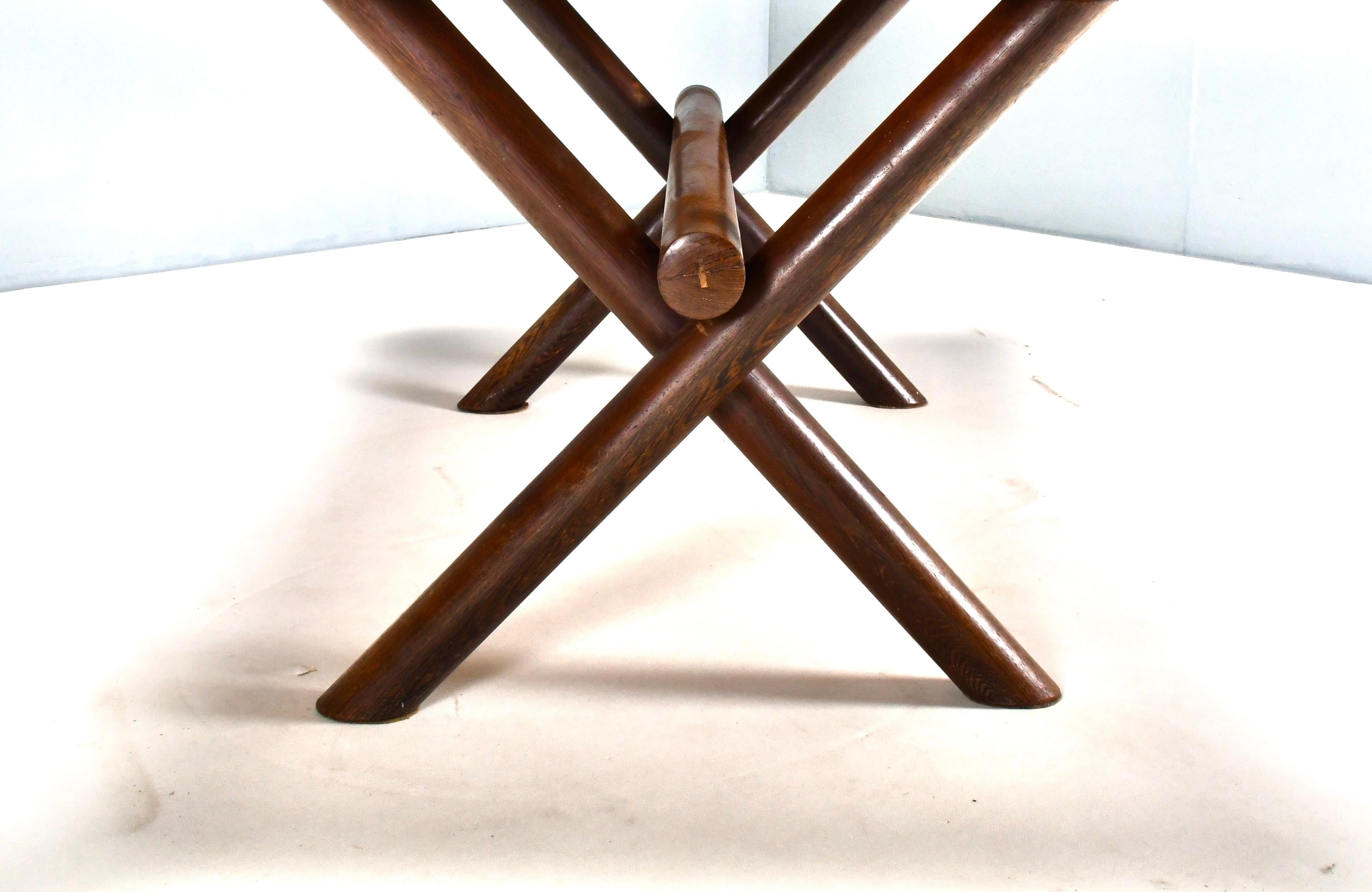 Rare cross legged wengé dining table with 6 solid wengé rush seat diningchairs by Martin Visser for 't Spectrum the Netherlands, 1960's.

Avant-gardist, minimalist & art collector
Martin Visser (1922-2009) is one of the Netherland's most famous