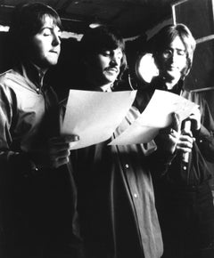 Paul McCartney, Ringo Starr, and John Lennon Reading