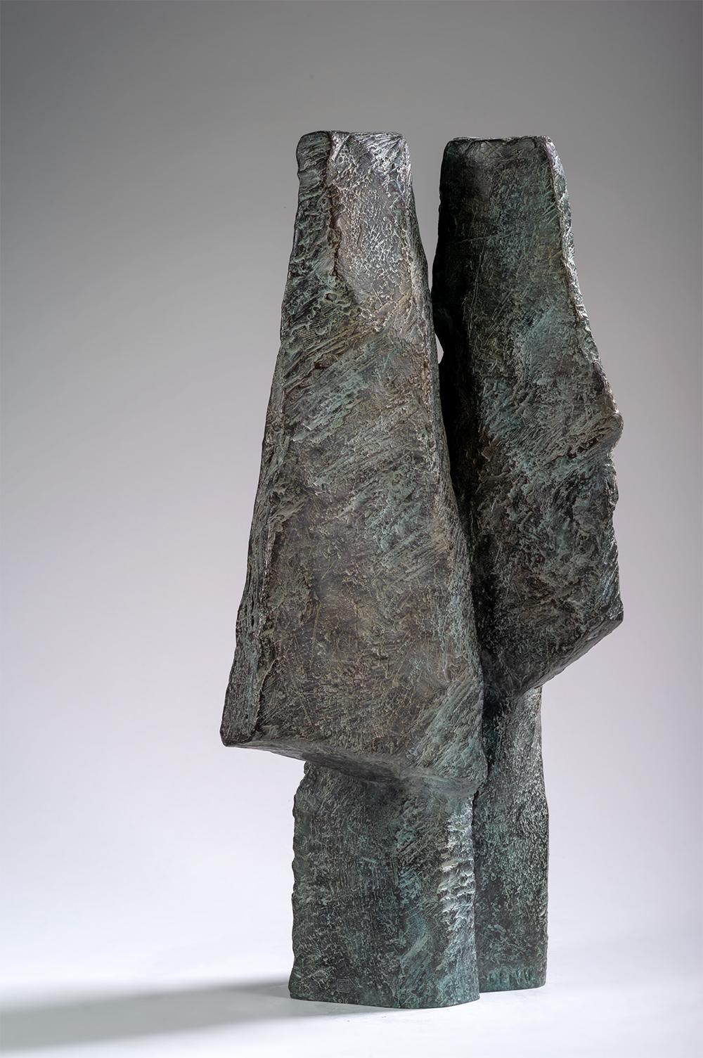 Janus Heads is a bronze sculpture by French contemporary artist Martine Demal, dimensions are 54 × 26 × 17 cm (21.3 × 10.2 × 6.7 in). 
The sculpture is signed and numbered, it is part of a limited edition of 8 editions + 4 artist’s proofs, and comes