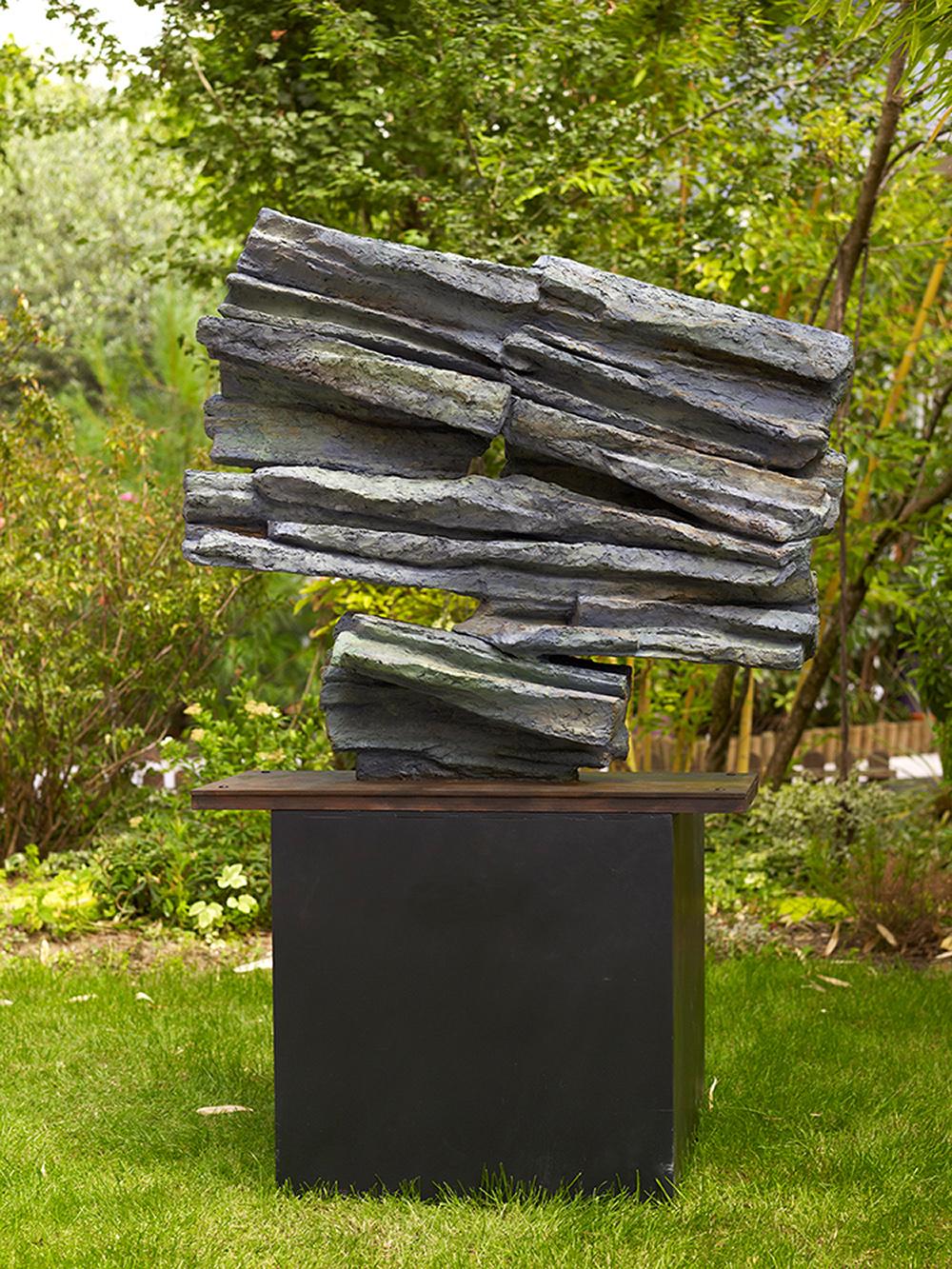 Signs and Writings No. 3 is a monumental bronze sculpture by contemporary artist Martine Demal, dimensions including patinated brass base are 93 × 102 × 33 cm (36.6 × 40.2 × 13 in). 
The sculpture is signed and numbered, it is part of a limited