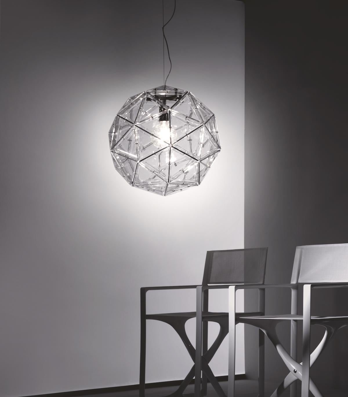 Poliedro 1722 pendant light by Elio Martinelli.

Technical specifications:
Materials:
Structure: Metal
Diffuser: Methacrylate

LED: 1x6W E27 
Flux: 600Lm 
Kelvin: 3000°
Class A+
CRI: >80
Duration: 30000h.

Device specifications:
Type