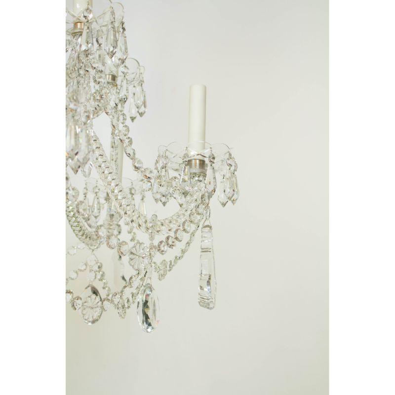 Signed Martinez Y Ortz Chandelier, Twelve Lights, Roped Crystal arms and large pendalog Crystals. Spain, C. 1980. Completely Cleaned and Rewired. Ready for installation.

Dimensions:
Height: 48