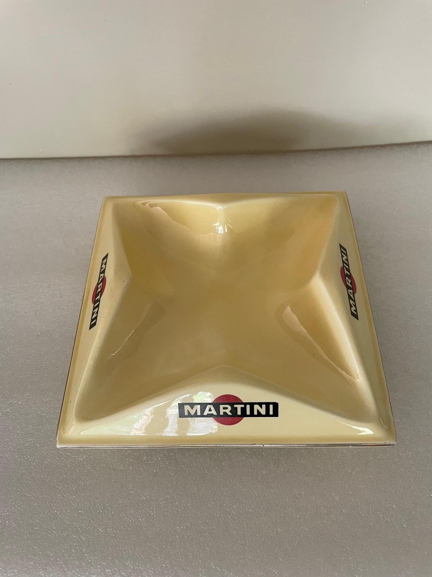 Martini ashtray that can be used as a pocket emptier, made in France by Proceram, good size.