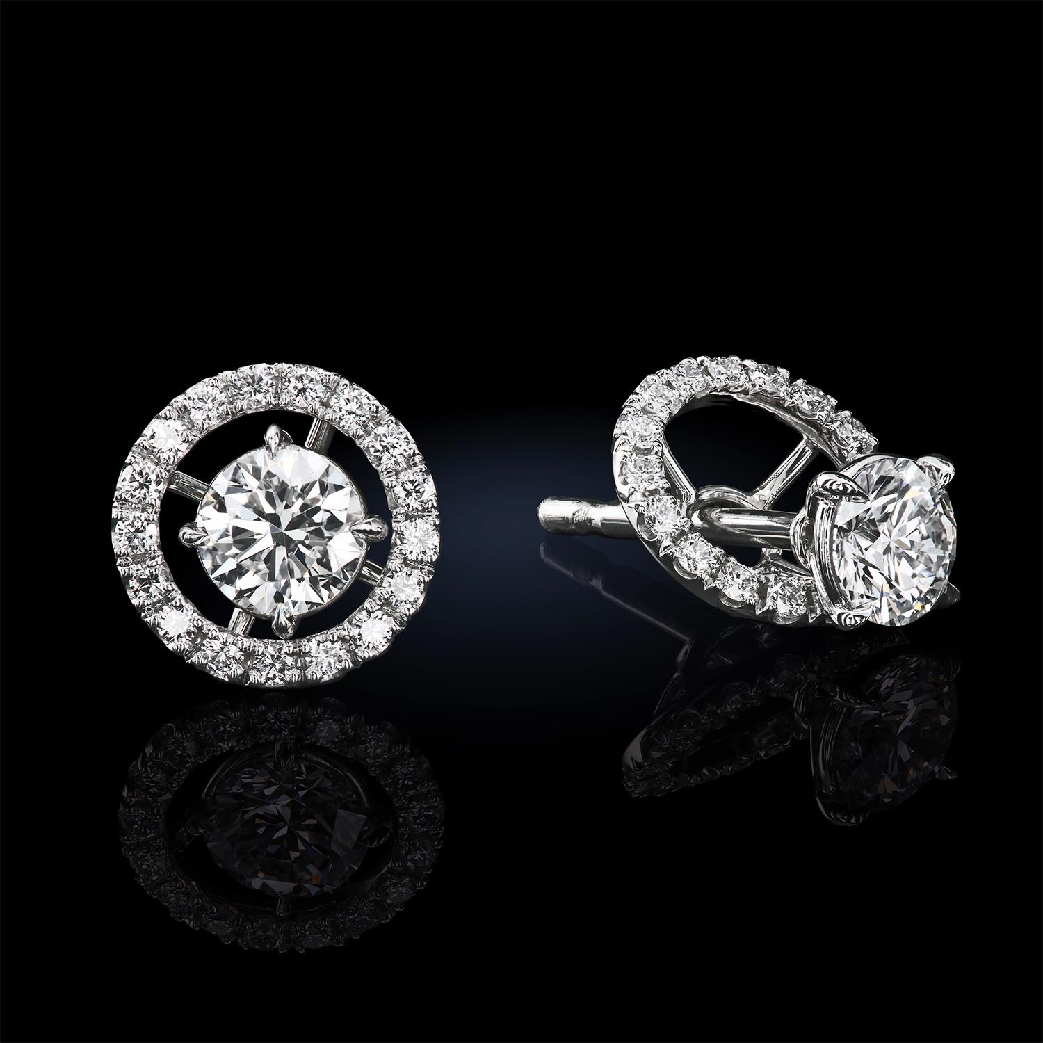 Leon Mege everlasting four-prong martini studs with removable diamond jackets. Approximately 0.30-carat each, the micro pave jacket's outside diameter is approximately 8 mm.
Natural F/VS diamonds approximately 0.90 carat total weight.