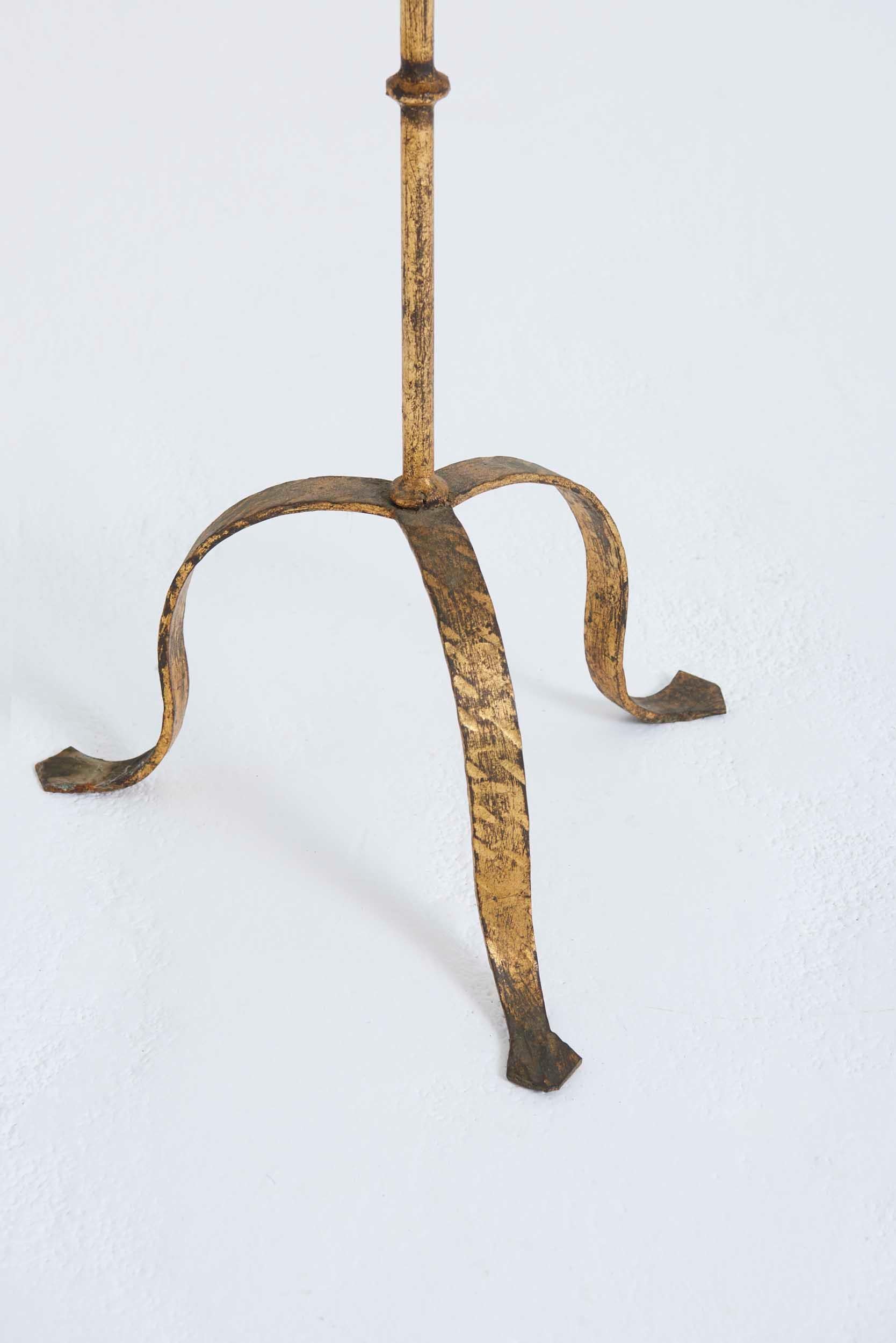 A forged iron martini table
Spain, third quarter of the 20th Century
