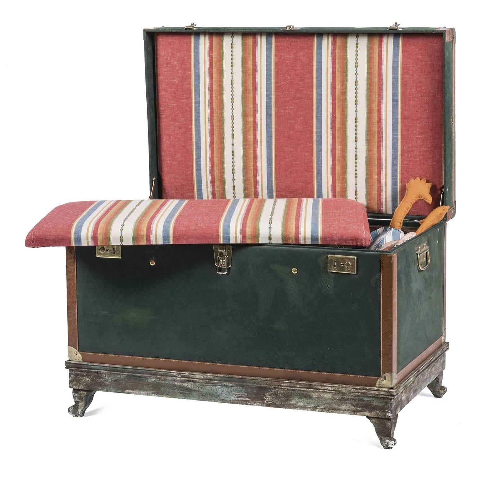 Combining an exquisite and whimsical decorative quality with the functionality of a small sofa, this eclectic loveseat will be a precious addition to an entryway, a small living room, a bedroom, or a study. Elegant and striking, a vintage trunk