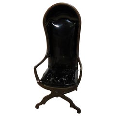 Patent Leather Upholstered Walnut Canopy or Porter Chair
