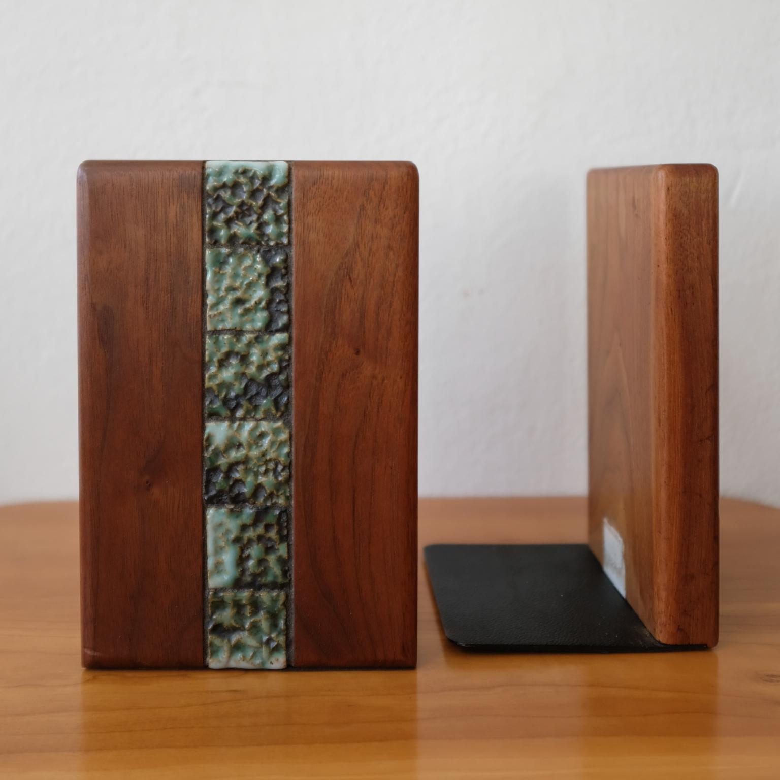Bookends with ceramic tile by Jane and Gordon Martz for their company, Marshall Studios. Includes a Marshall Studios tag.