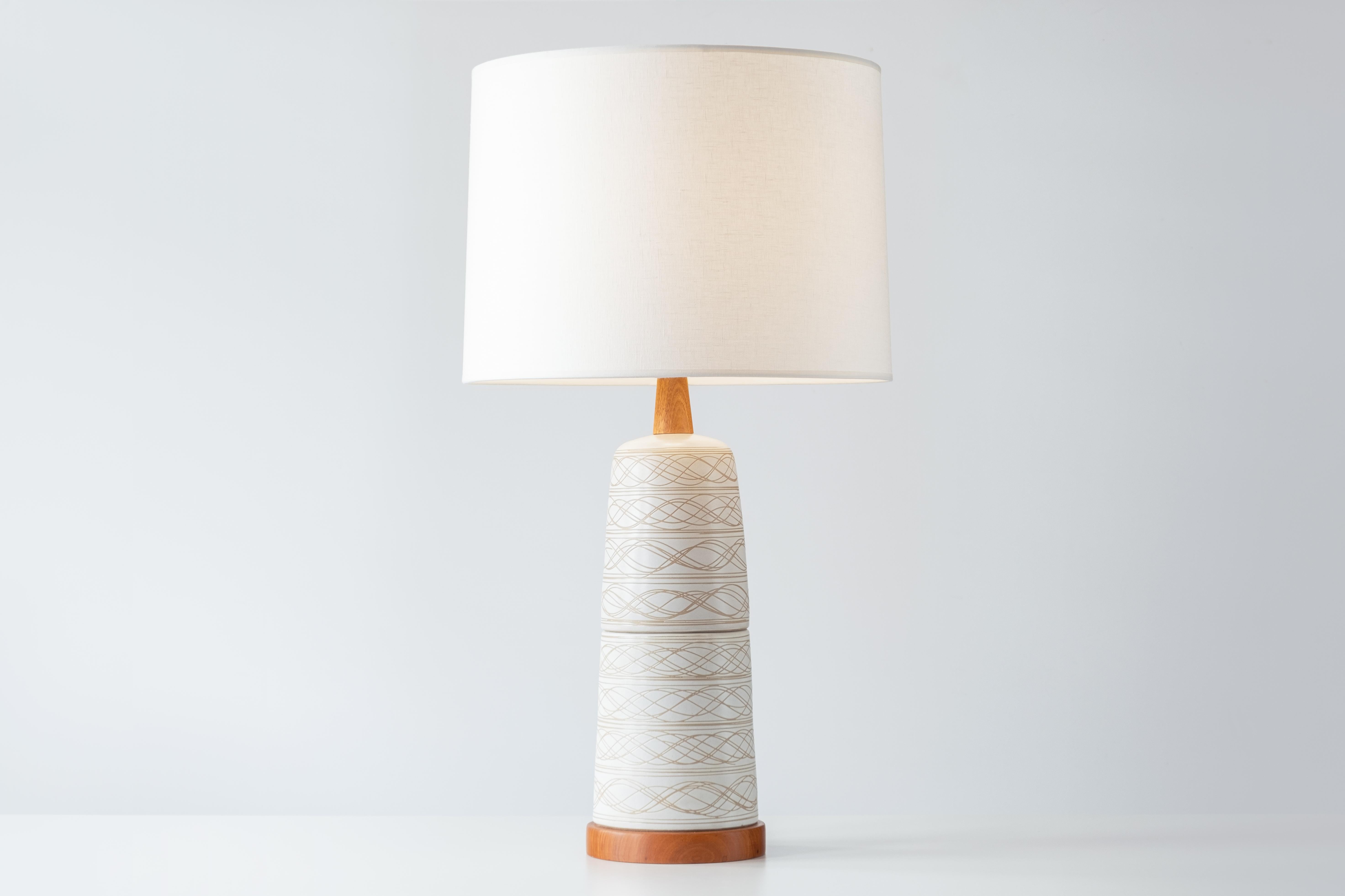 What is it?
—
Another gem from the masters of mid century lightning – Gordon and Jane Martz. Not too big, not too small – this ceramic lamp is equally at home on an end table or credenza as it is on a dresser or bedside table.

This signed Martz