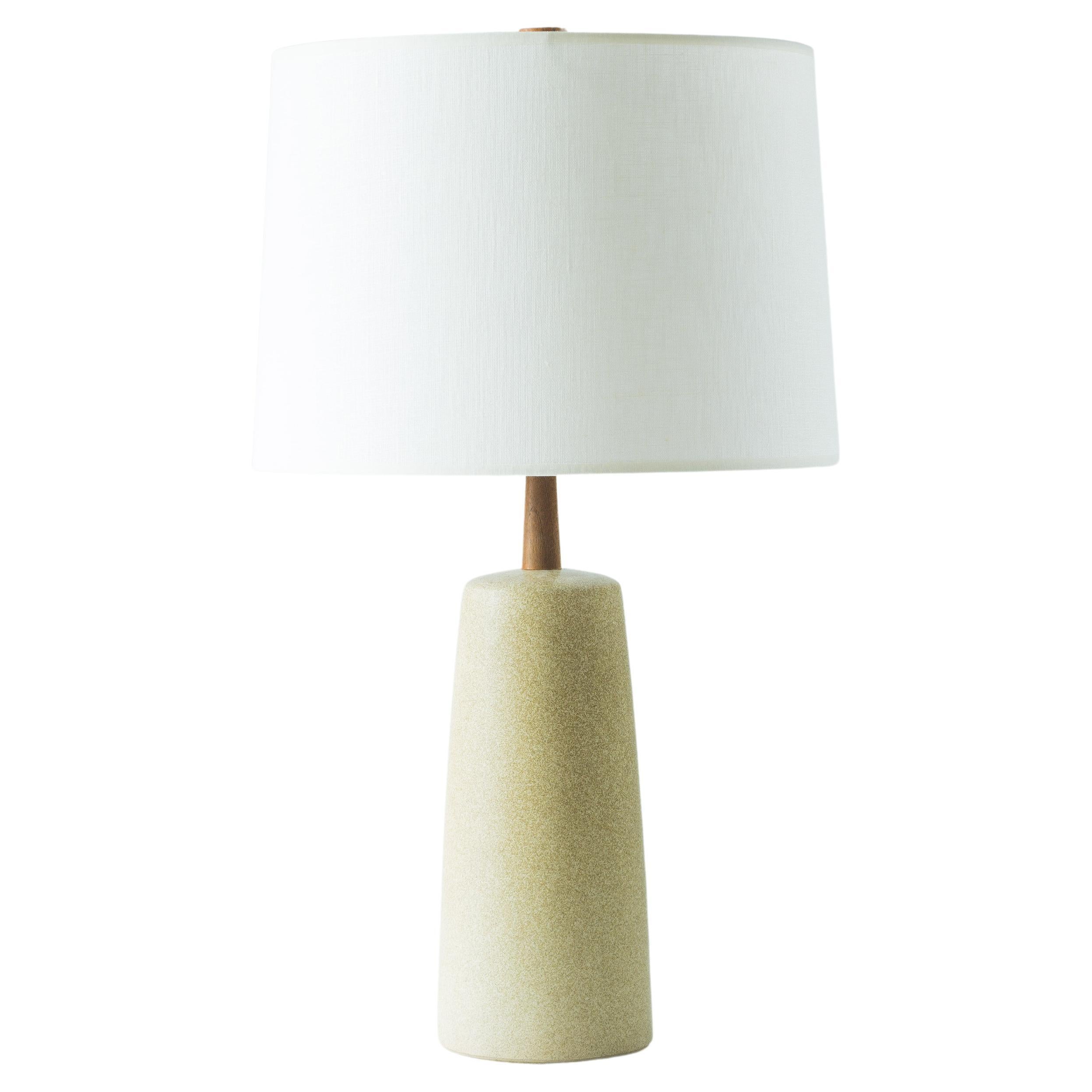 What is it?
—
Another gem from the masters of mid century lightning – Gordon and Jane Martz. Not too big, not too small – this ceramic lamp is equally at home on an end table or credenza as it is on a dresser or bedside table.

This signed Martz