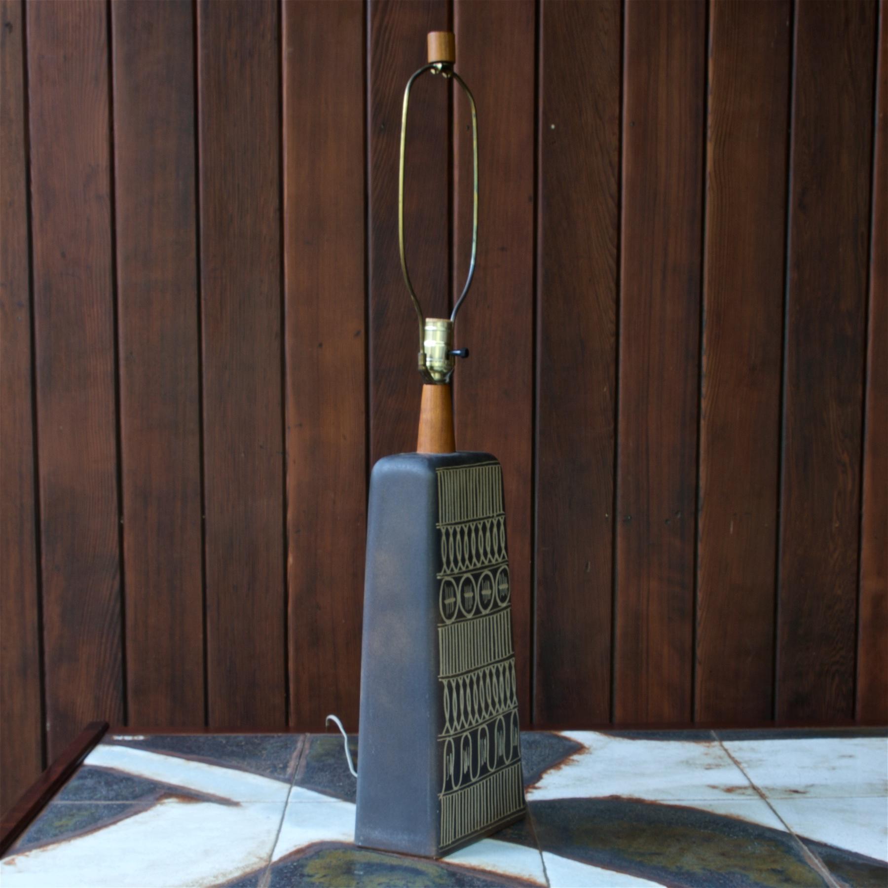 Rare model in great shape, ready for a new shade. Ceramic is in a matte finish. The original shade was 15 tapering to 13, and 15 inches high.
