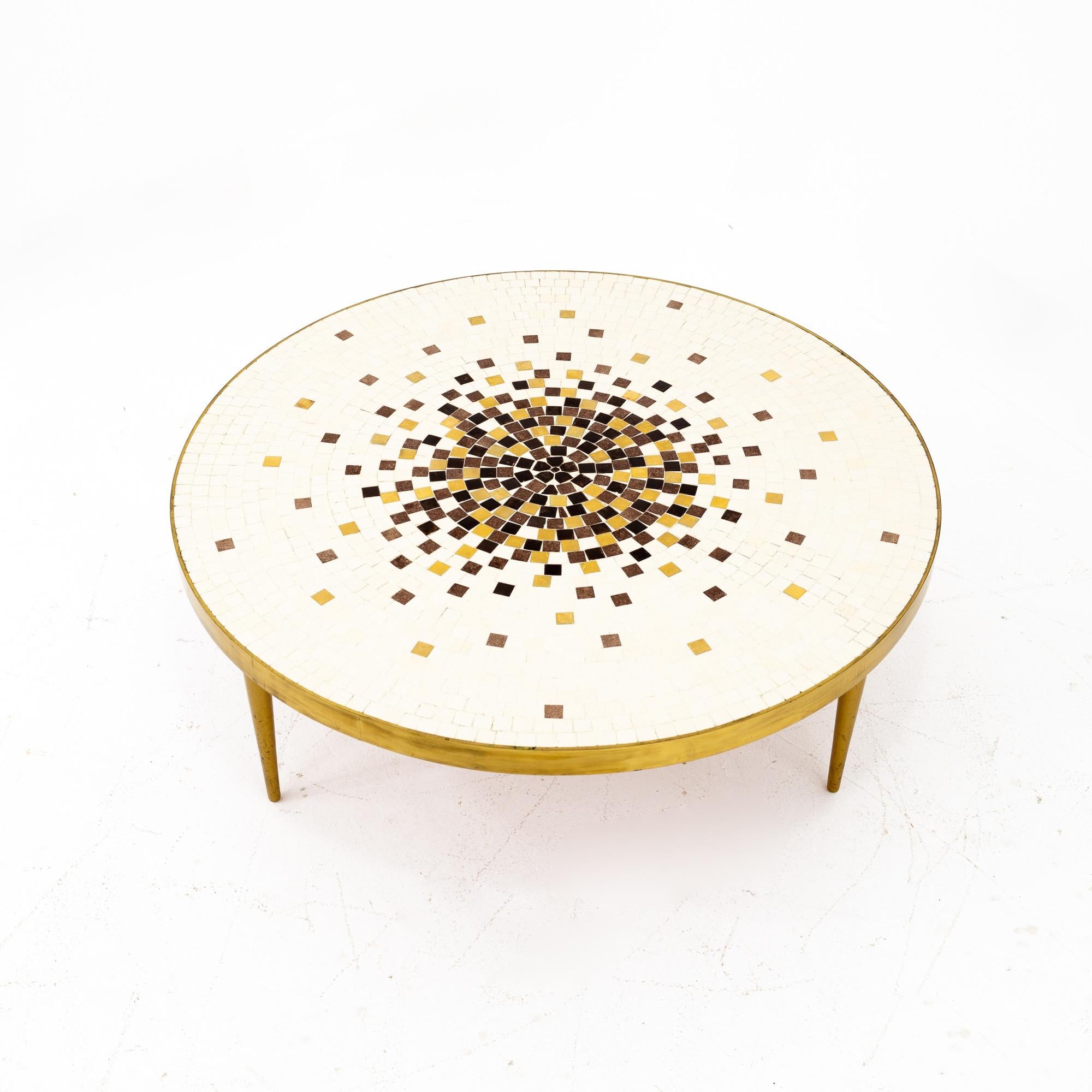 Martz style midcentury round brass mosaic tile coffee table
This table is 36 wide and 36 deep by 14 inches high

Each piece of furniture is available in what we call restored vintage condition. Upon purchase it is thoroughly cleaned and minor