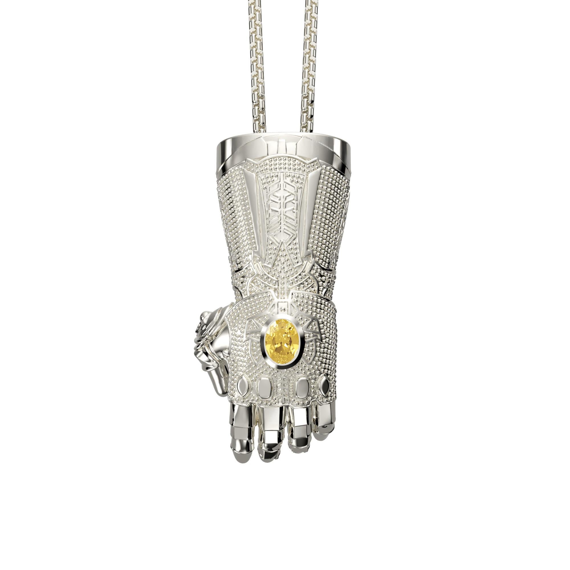 The Inevitable Pendant is a striking tribute to the iconic Infinity Gauntlet, crafted for those who value both storytelling and design.

Cast in sterling silver and engineered to house an authentic Infinity Gemstone, this pendant channels the