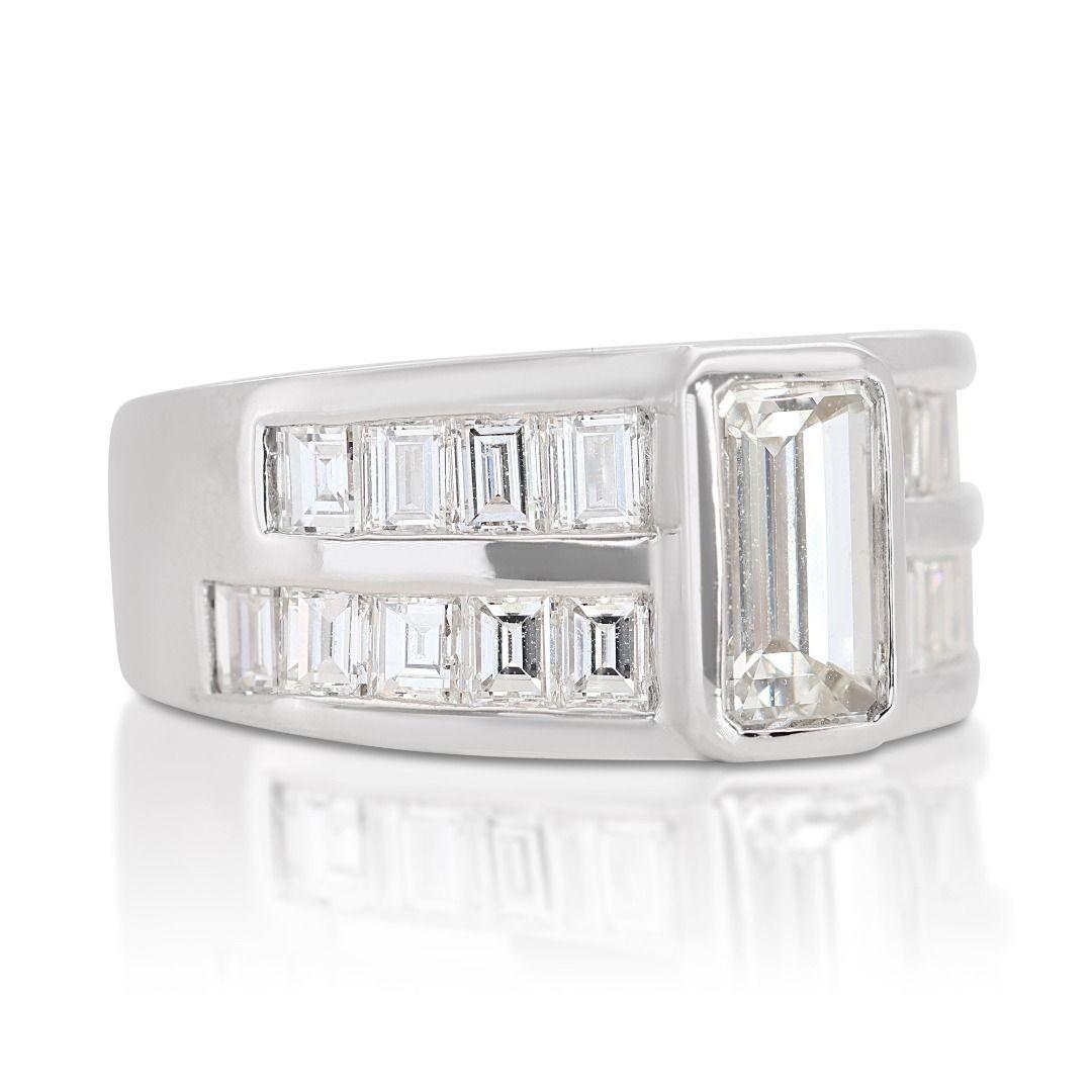 At its center, this ring features a magnificent 1.00-carat emerald-cut natural diamond, exuding brilliance and refinement. With a color grade of F-G and a clarity grade of VS2-SI1, this stunning diamond radiates pure luxury and beauty. Enhanced by