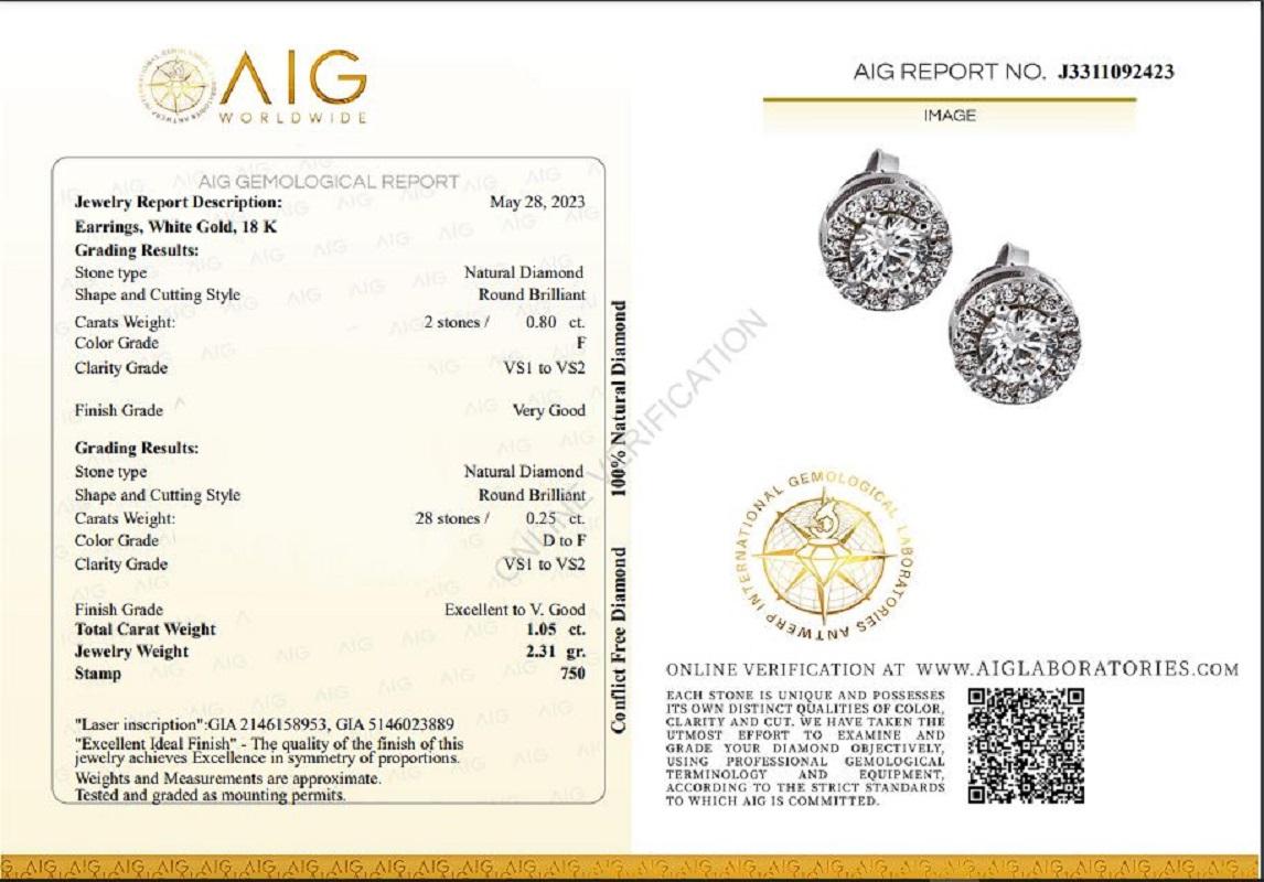 A classic pair of halo stud earrings with a dazzling 0.8 carat round brilliant natural diamonds. It has 0.25 carat of side diamonds which add more to its elegance. The jewelry is made of 18K White Gold with a high quality polish. It comes with AIG