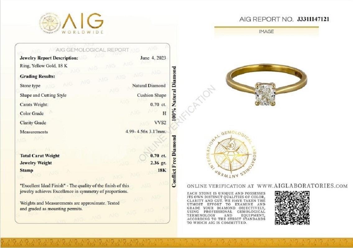 A classic solitaire ring with a dazzling 0.7-carat cushion shape diamond. The jewelry is made of 18K Yellow Gold with a high-quality polish. It comes with an AIG certificate and a nice jewelry box.

1 diamond main stone of 0.7 carat
cut: cushion
