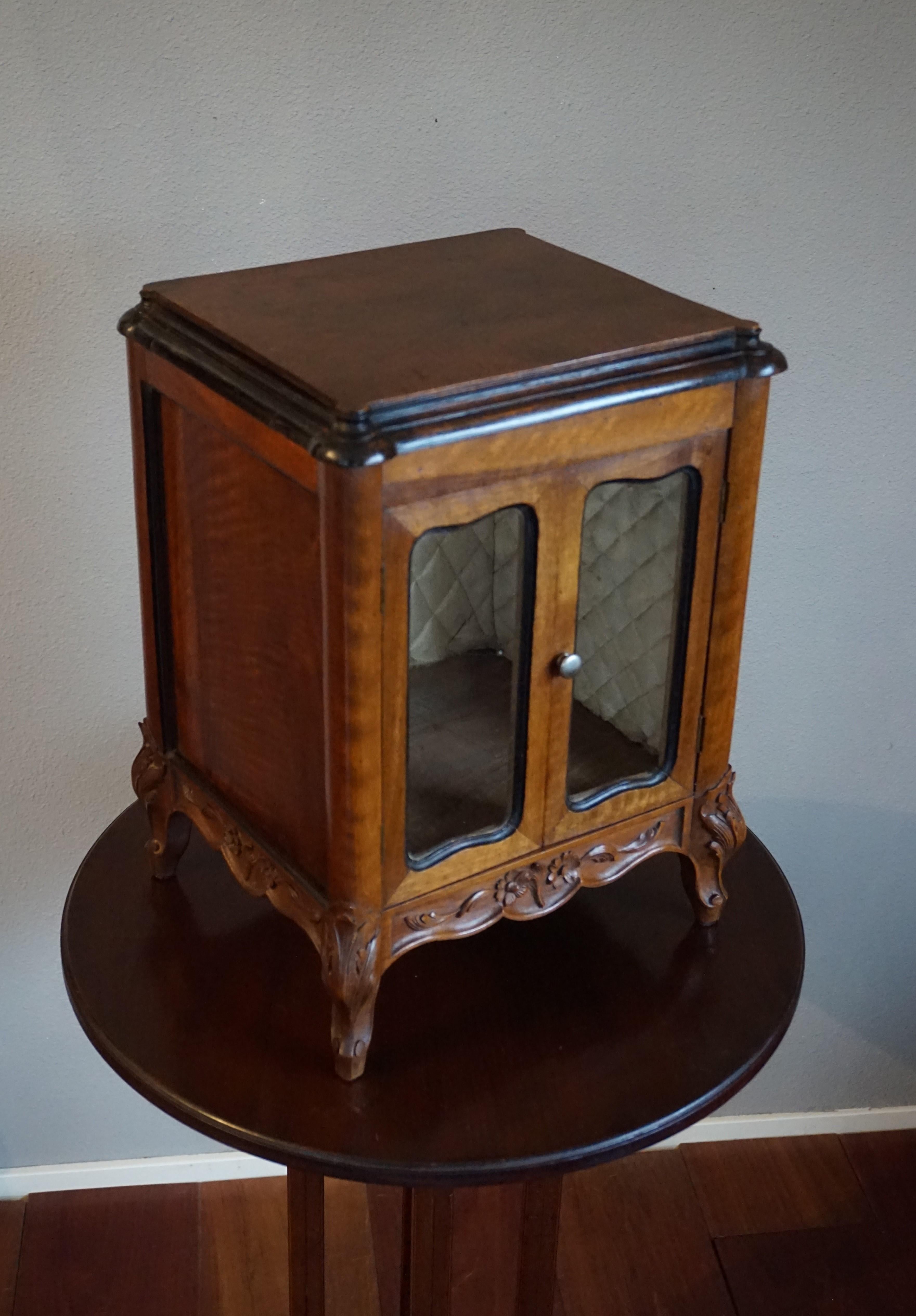 Antique French miniature cabinet with the best patina ever.

This beautifully designed and all handcrafted French masterpiece is an absolute joy to own and look at. The stunning and solid nutwood has aged beautifully and the warm color is unlike