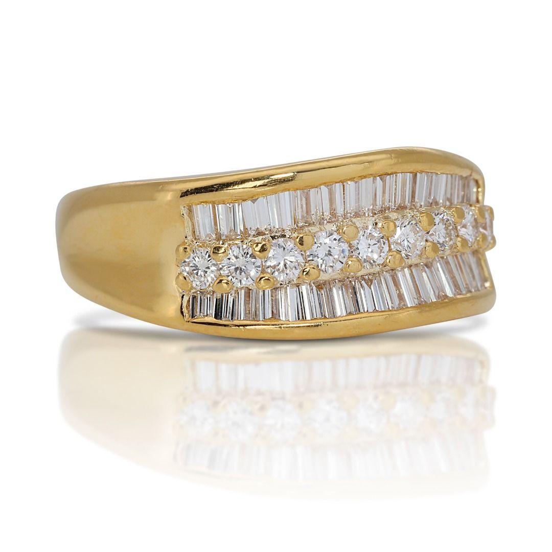 This ring captures the essence of radiant luxury with a dazzling ensemble of diamonds, showcasing a captivating 0.53 carat round brilliant as the centerpiece. Bathed in the warm glow of 20K yellow gold, the diamond boasts an H-I color grade for