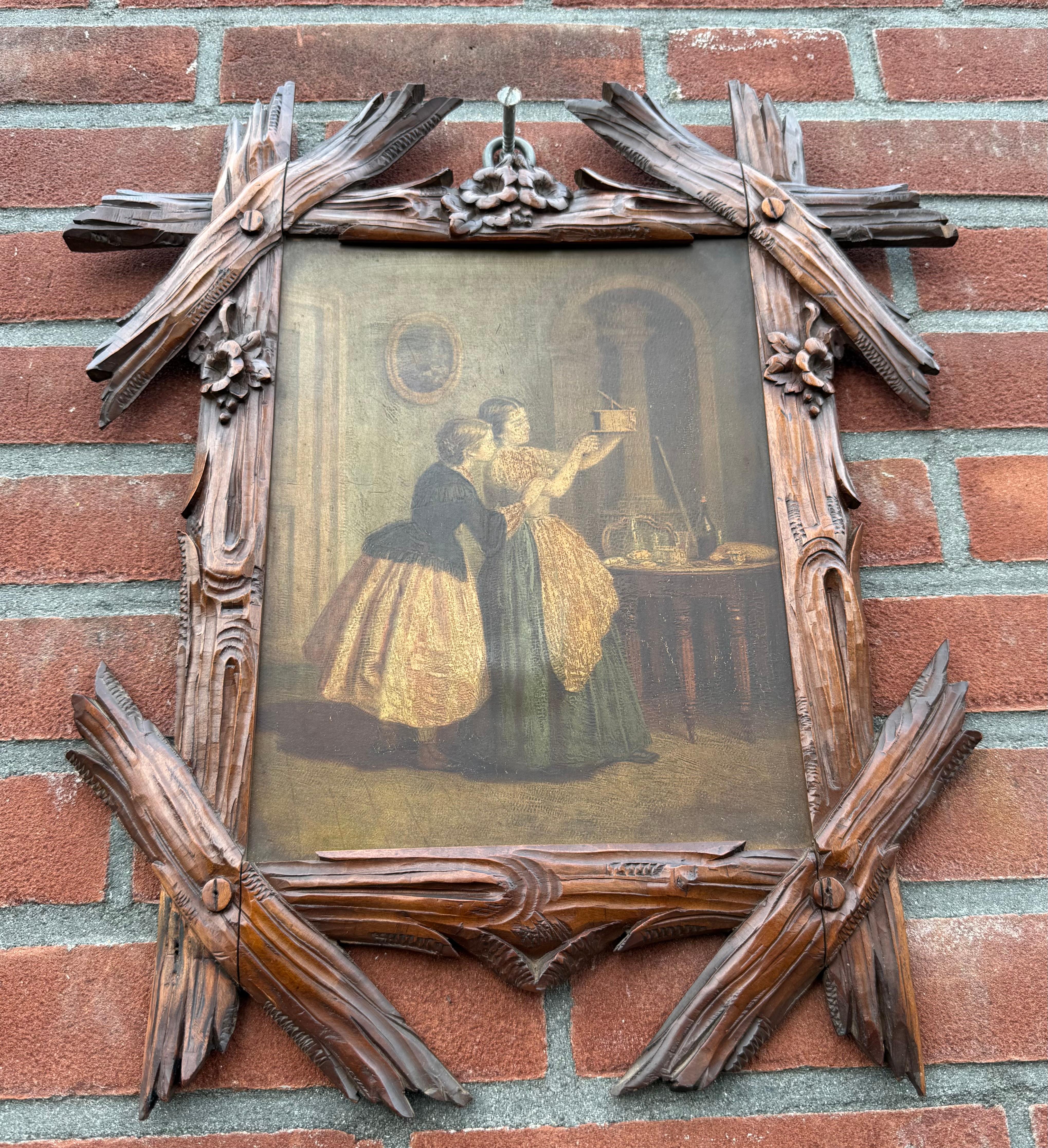 Patinated Marvelous and Antique Pair of 19th Century Black Forest Hand-Carved Wood Frames For Sale