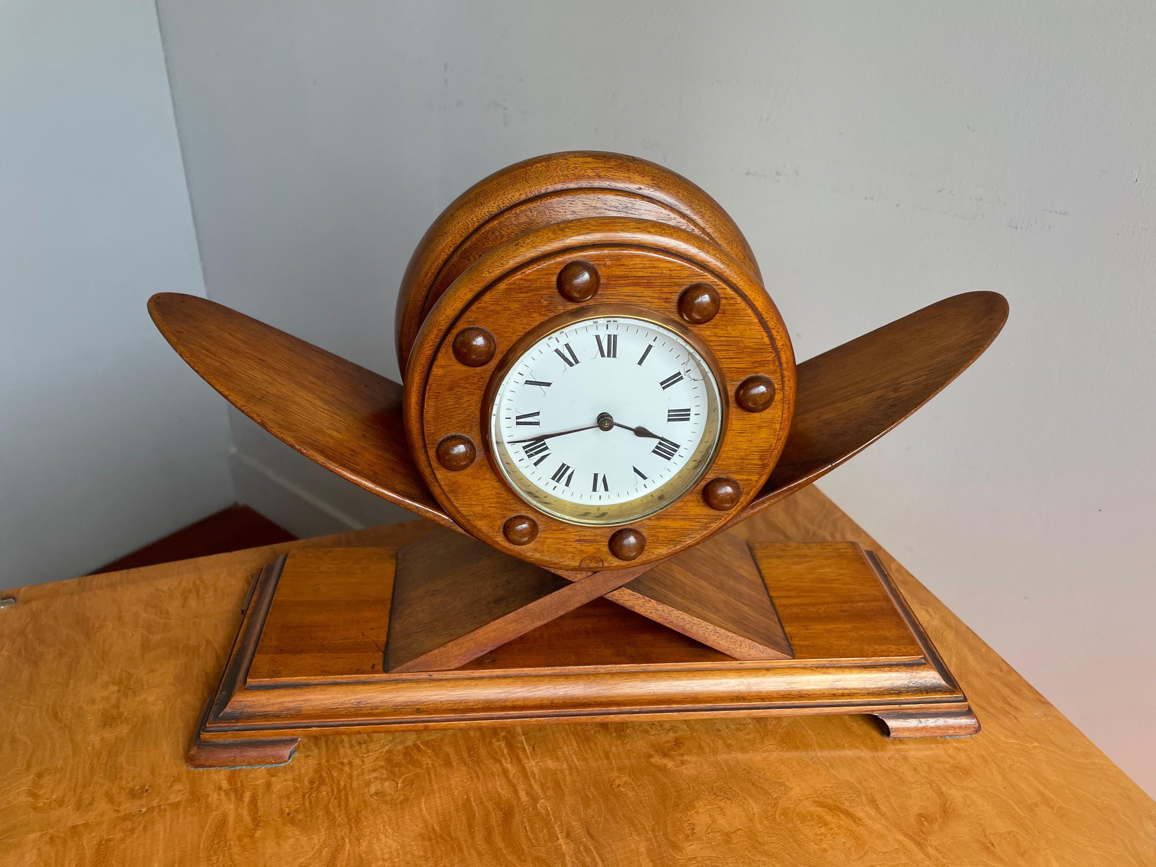 Beautifully handcrafted and practical size, airplane theme table clock.

Over the years we have sold a number of striking (no pun intended) clocks, but never one as decorative and cool looking as this one. Aviation has made the world significantly