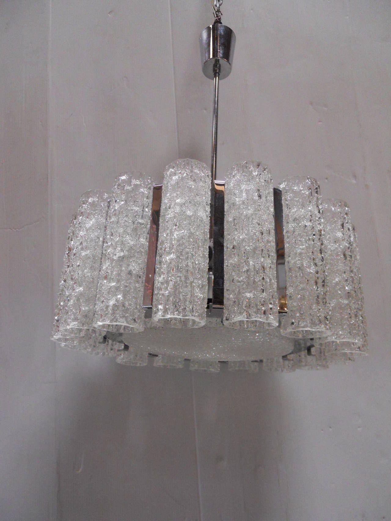 Marvelous Doria glass tubes and chrome chandelier, handblown in Murano, Italy.

Diameter: 21