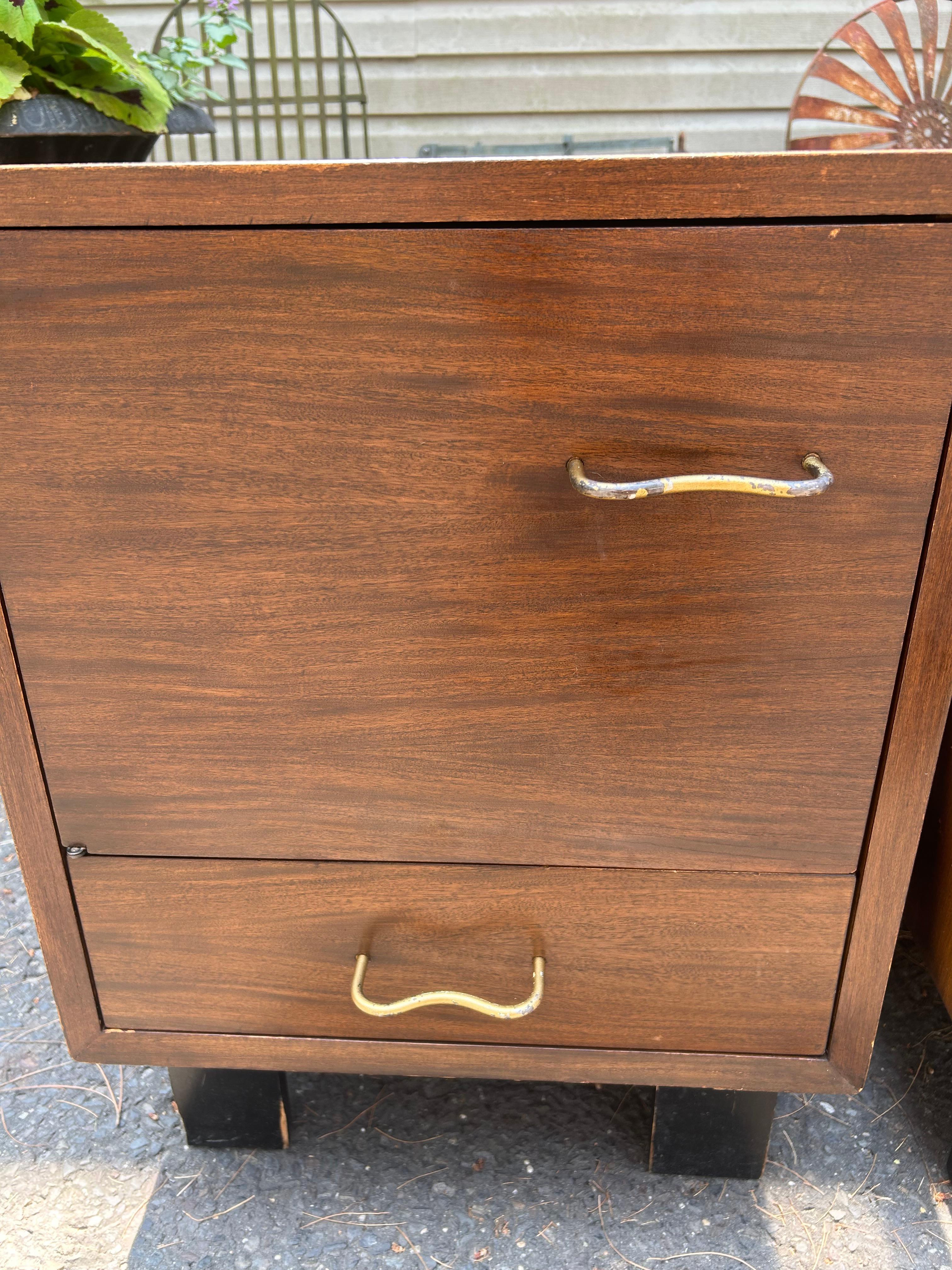 Stylish pair of George Nelson for Herman Miller Primavera night stands.  One stand is slightly different than the other having an open space instead of a door.  These stands measure 24