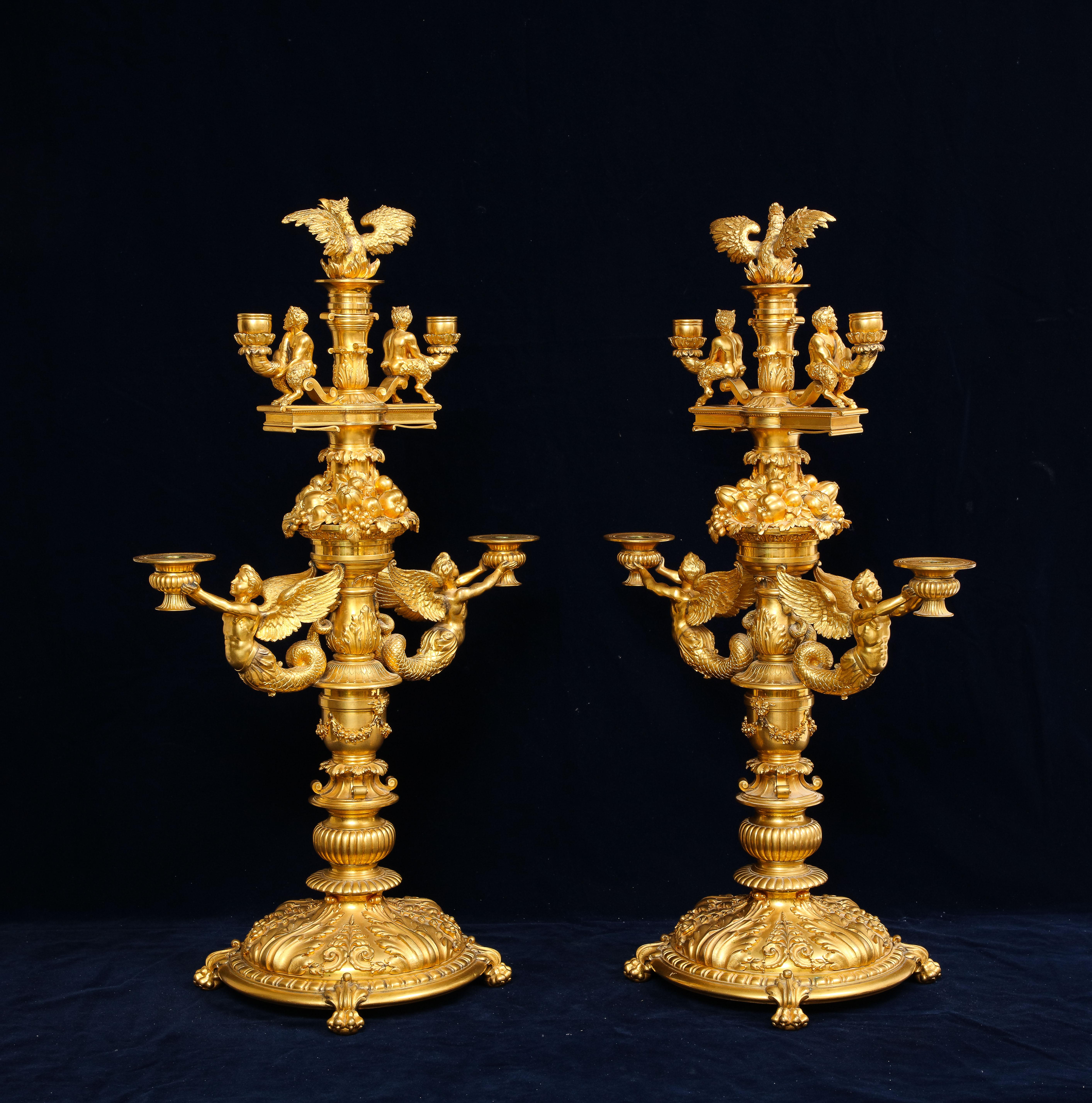 Français Merveilleuse paire de candélabres à quatre bras en bronze doré français du 19ème siècle, signés P. Canaux en vente