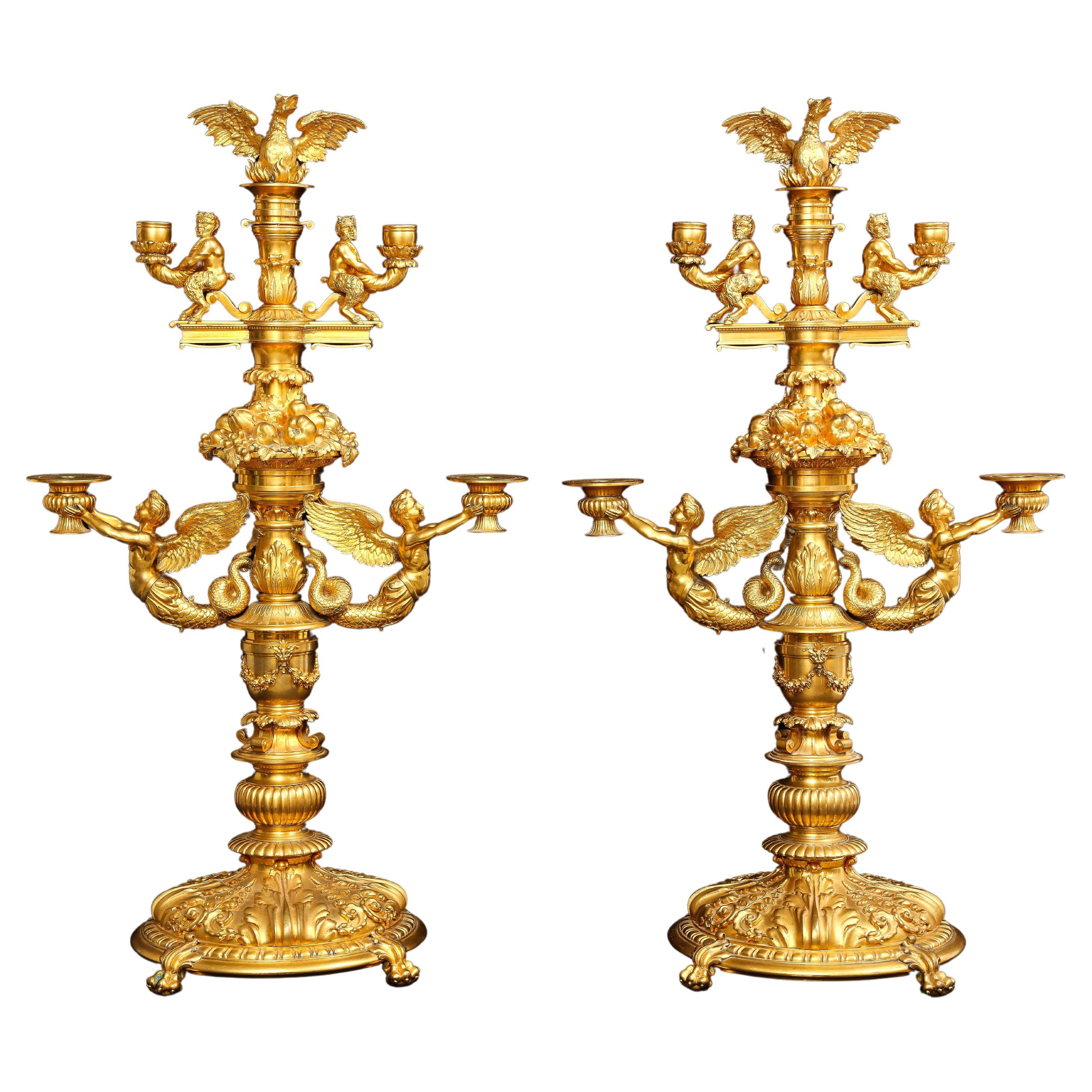 Merveilleuse paire de candélabres à quatre bras en bronze doré français du 19ème siècle, signés P. Canaux en vente