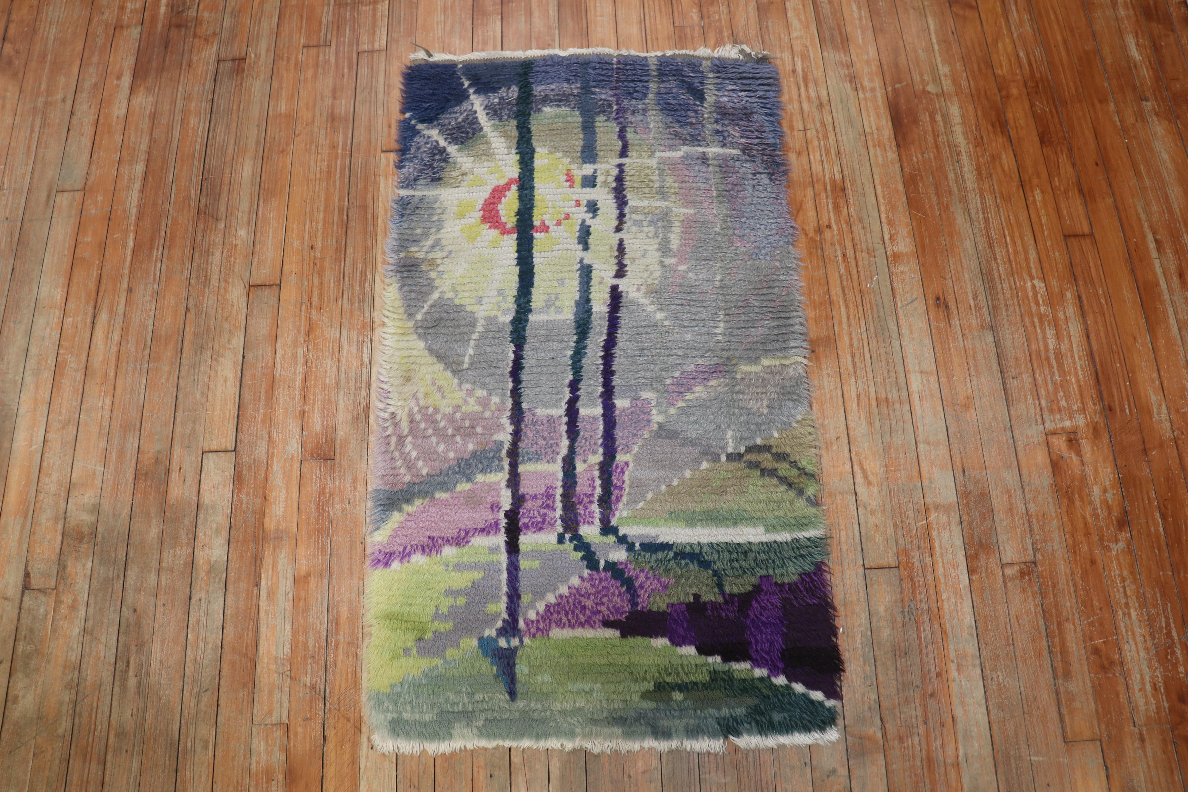 Marvelous small plush Swedish Rya rug from the mid-20th century.

Measures: 2'5” x 4'1”

Swedish Rya rugs are extremely colorful, lovely and quite chic and each have their own character to them. They tend to have thicker shaggy piles which were