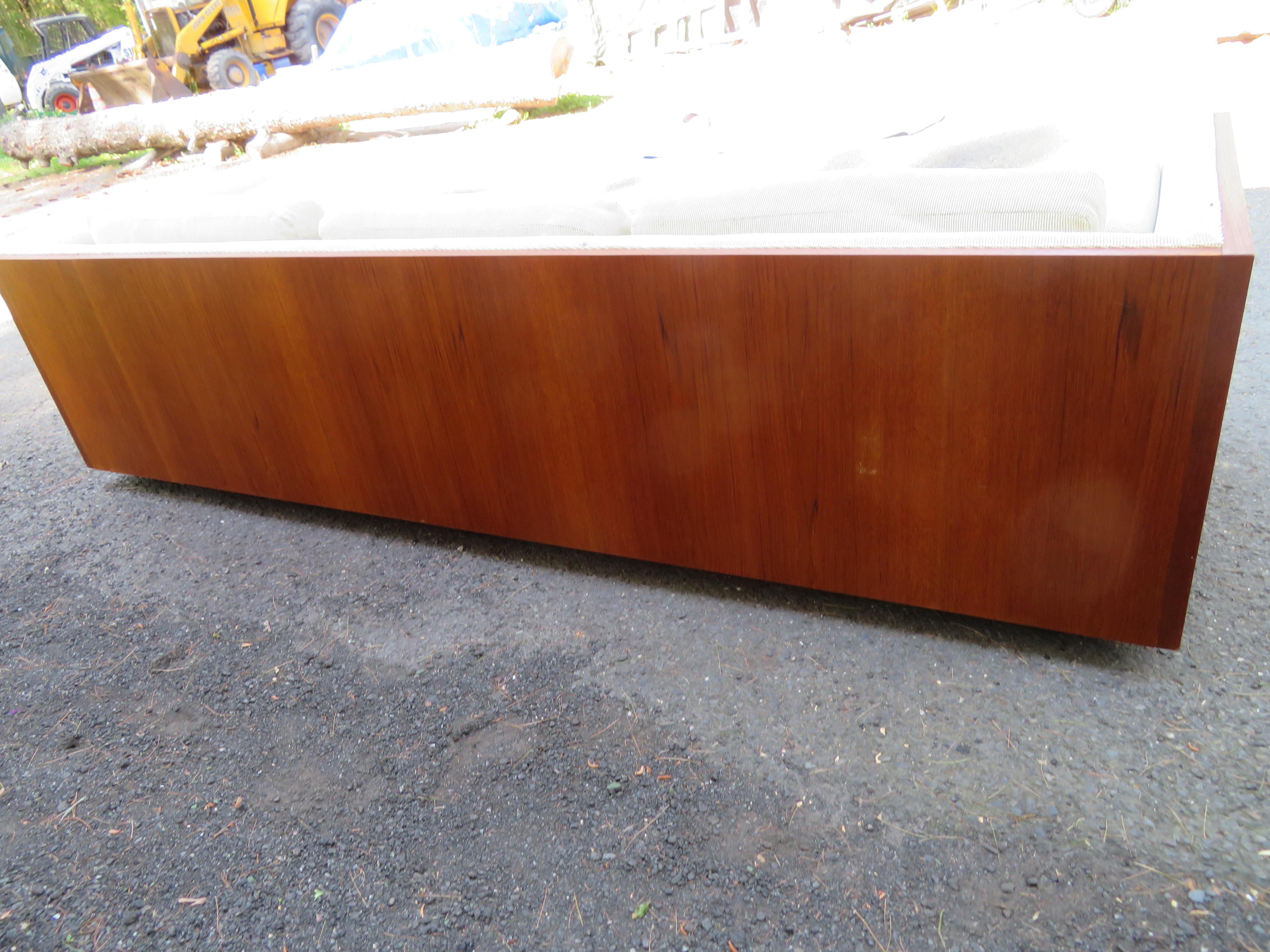 Marvelous Milo Baughman style XL Teak case sofa. This sofa is a bit longer than most others we have had measuring 28