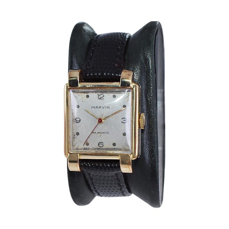 FACTORY / HOUSE: Marvin Watch Company
STYLE / REFERENCE: Art Deco Style
METAL / MATERIAL: Yellow Gold Filled
CIRCA / YEAR: 1950's
DIMENSIONS / SIZE: Length 35mm x Width 26mm
MOVEMENT / CALIBER: Manual Winding / 17 Jewels / Cal.5208
DIAL / HANDS: