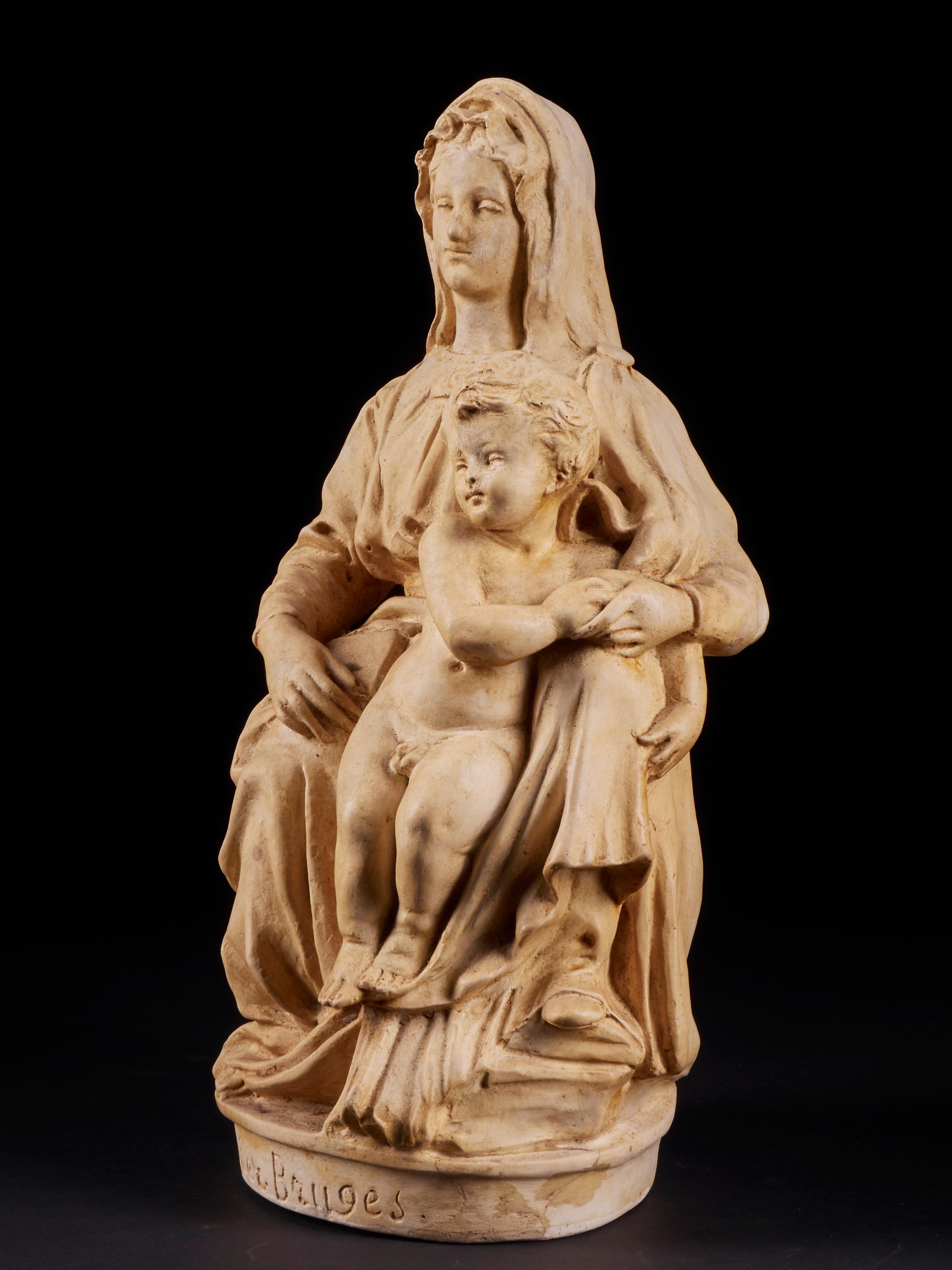 Rare statue of Mary and child made of painted plaster. This statue is signed Algget-Devliegher from Bruges Belgium. A stunning piece of folk art inspired by Michelangelo's statue exposed in the Onze-Lieve Vrouw cathedral in Bruges.