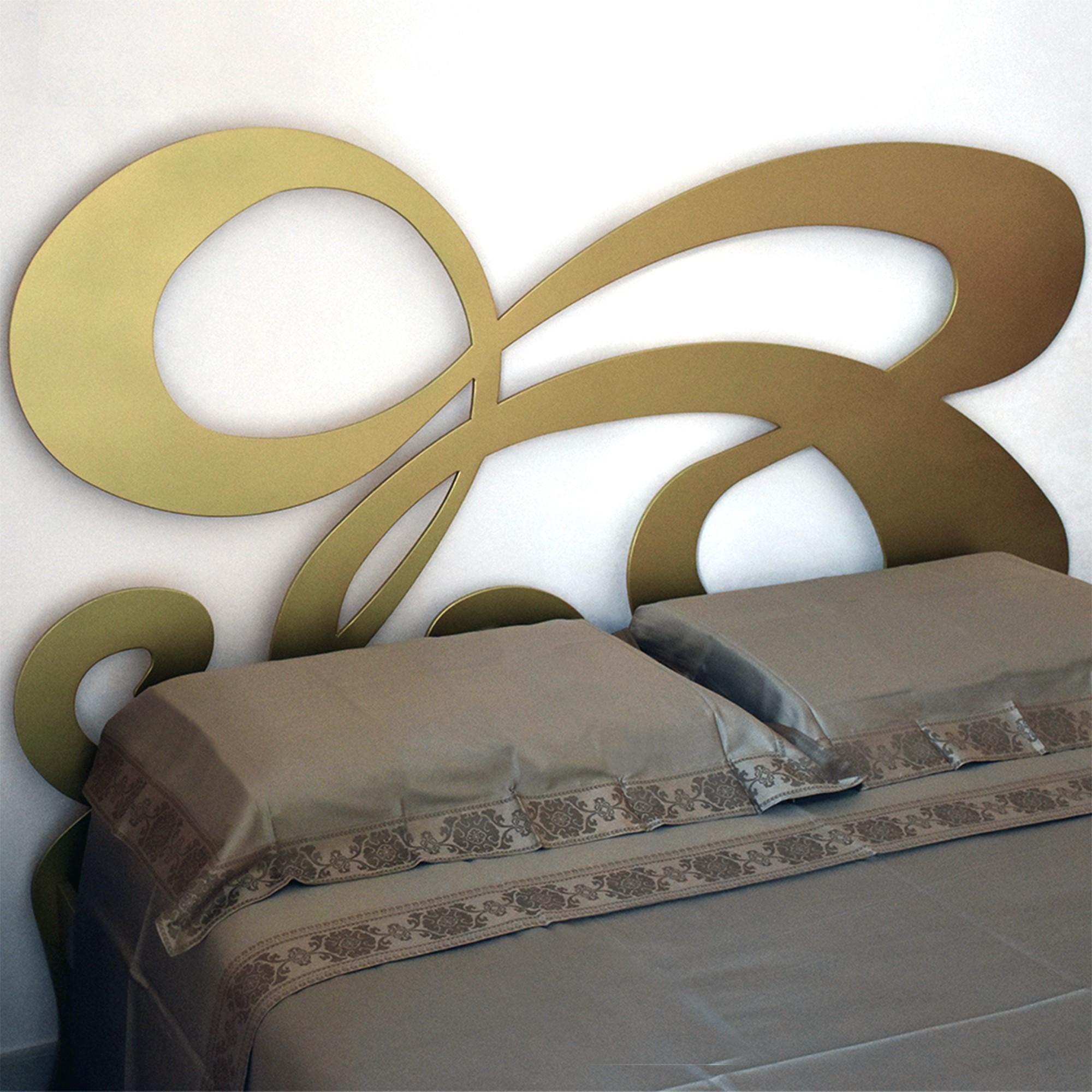Mary Bed by WM Metal Design
Dimensions: D 184 x W 202 x H 137 cm. 
Materials: Gold finish metal.

An elegant mix between classic and contemporary that becomes a timeless style, with harmonious and delicate shapes that extend along the headboard of