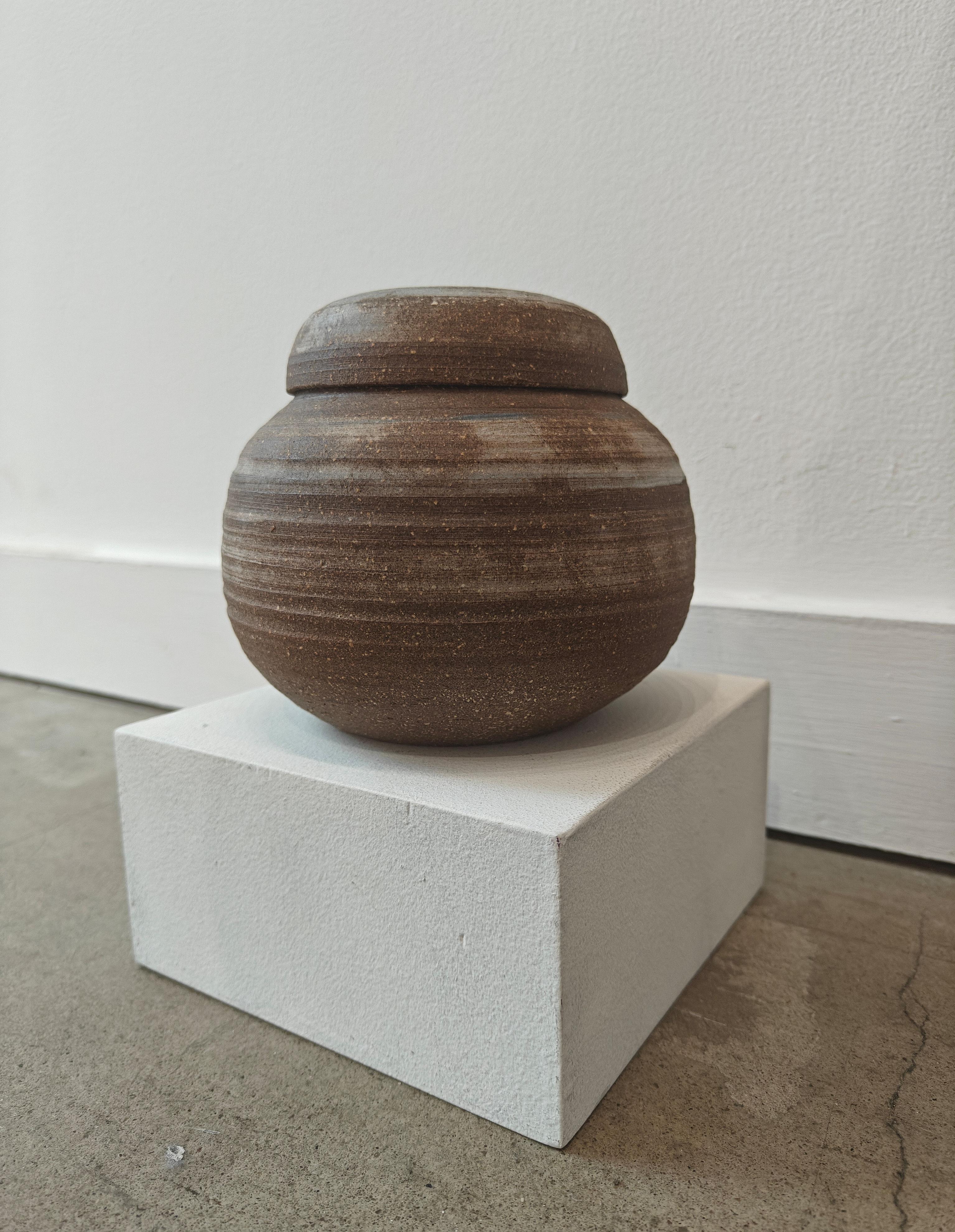Mary Caroline Richards
Ribbed Vase, circa 1970s
Glazed earthenware
4 1/2 x 6 inches

Provenance
Estate of Carolyn Brown, New York 2025.


Mary Caroline (M. C.) Richards (1916 – 1999) was born in Weiser, Idaho, and spent her childhood in Portland,