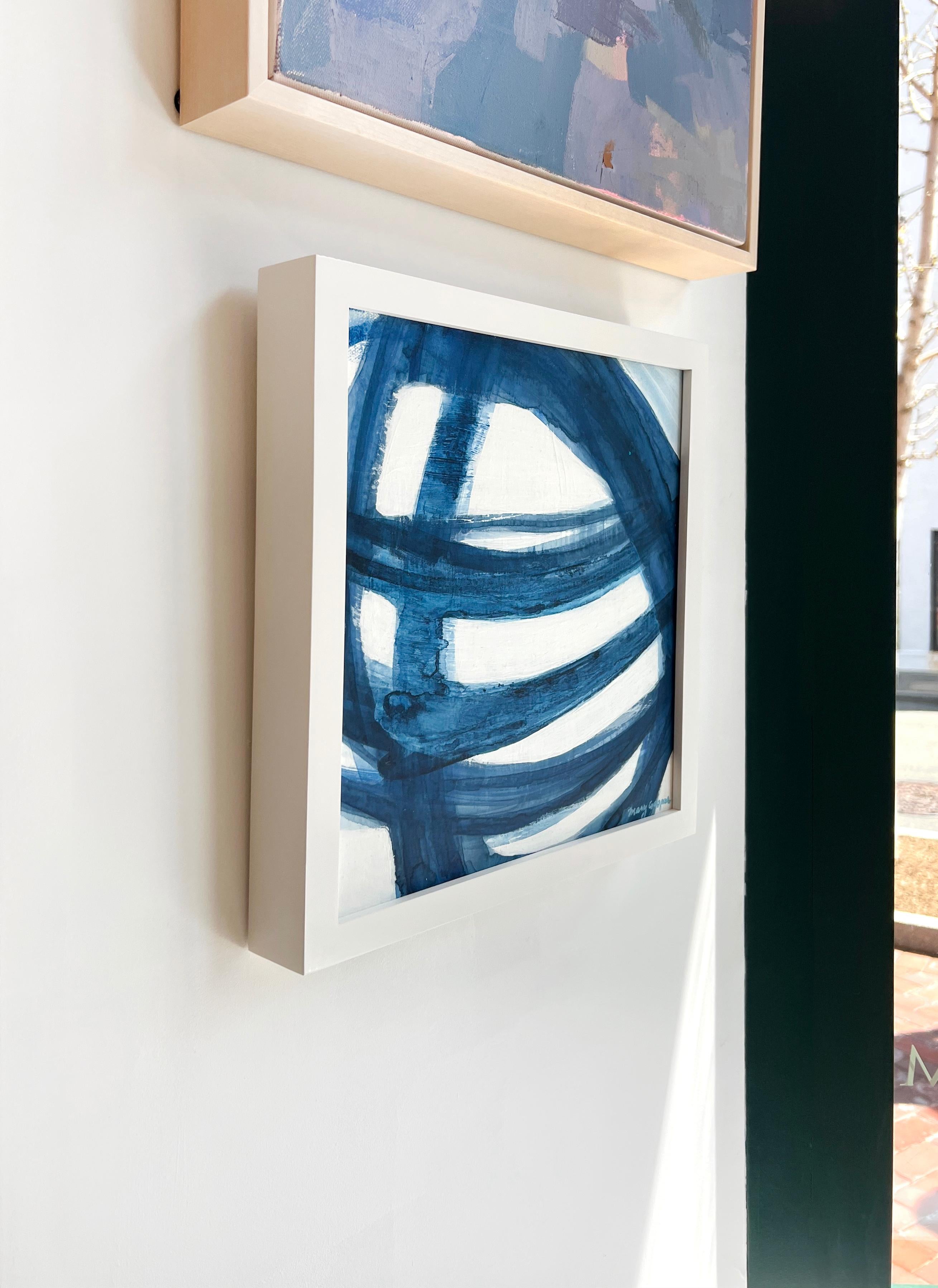 This abstract painting by Mary Gaspar features a cool blue and white palette. The artist organically moves a wash of blue acrylic and watercolor paint across the canvas in strokes to create what she calls, 