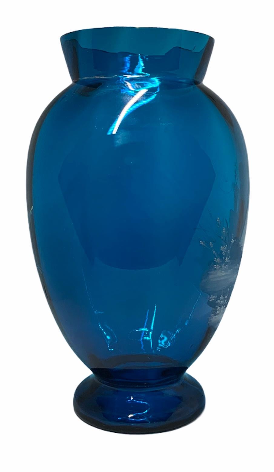 mary gregory blue glass vase