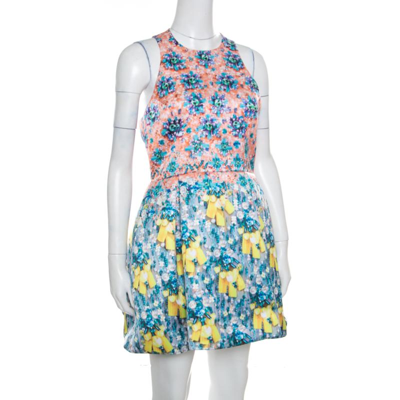 This gorgeous Silverfloss Ohara dress from Mary Katrantzou is what your wardrobe has been missing all this while! It is made of 100% polyester and features a lovely bejeweled bow print all over it. It flaunts a flattering silhouette and comes with a