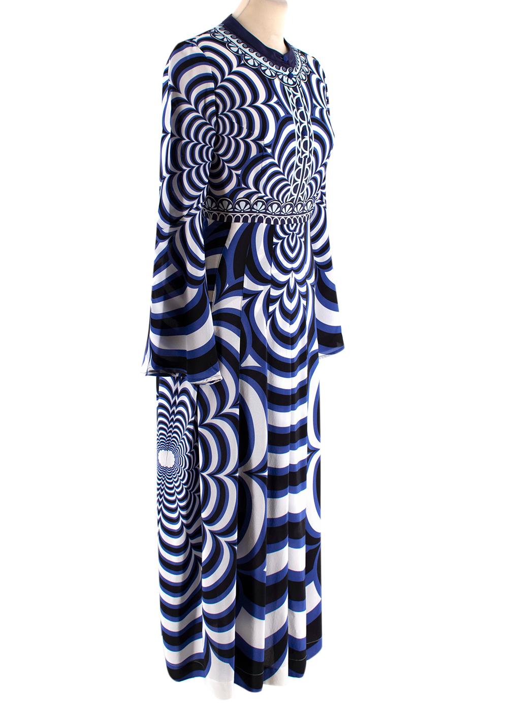 Mary Katrantzou Blue Printed Silk Dress

- Partially lined
- Pleated skirt
- Button up neckline
- Flared sleeves
- Abstract print
- Lightweight
- Rounded neckline 

Materials: 
100% Silk

Made in UK 
Specialist Dry clean only

Measurements:
Approx.